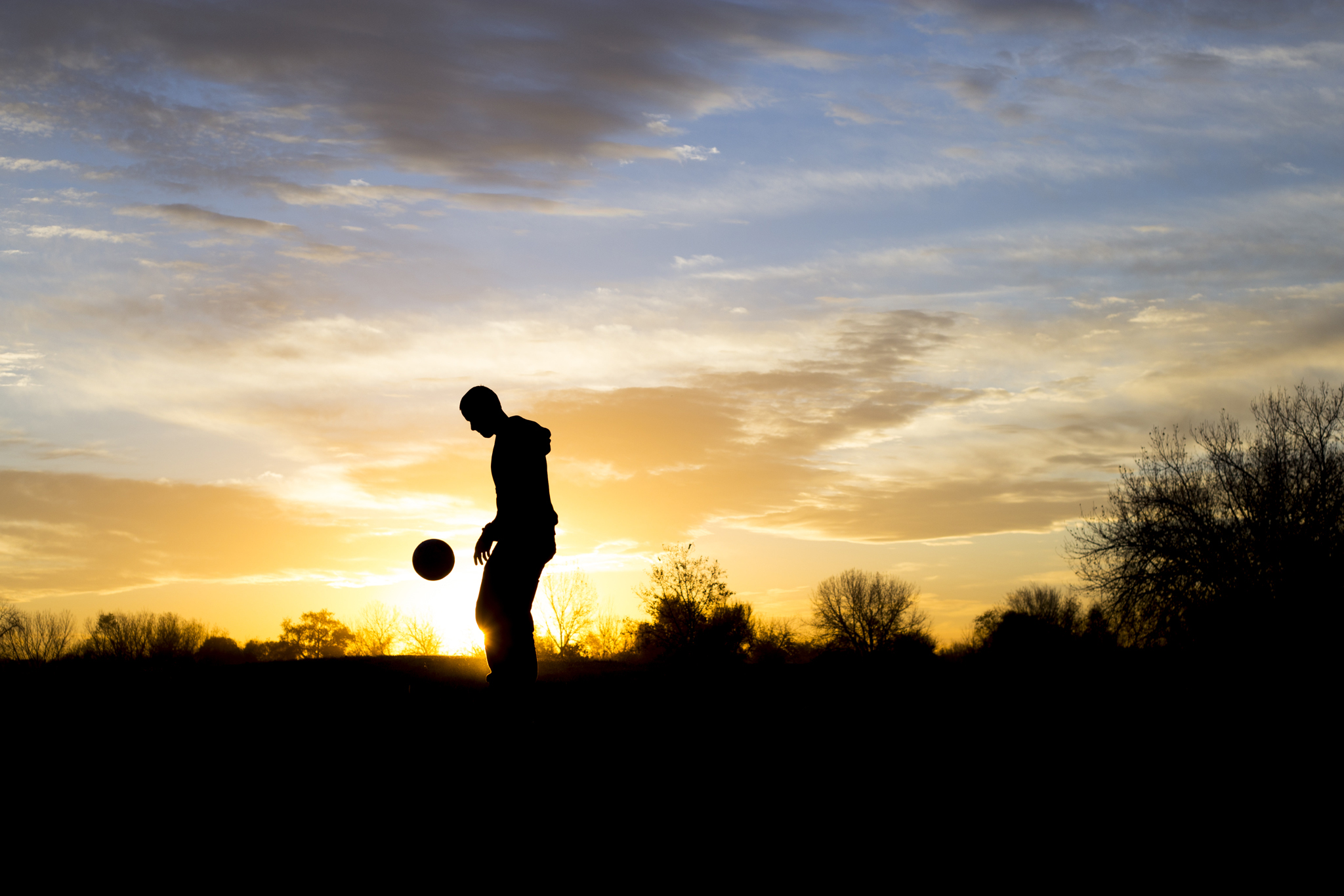 RiNo District, Denver, Colorado Senior Photographer - Manny's Silhouette Juggling Soccer Ball