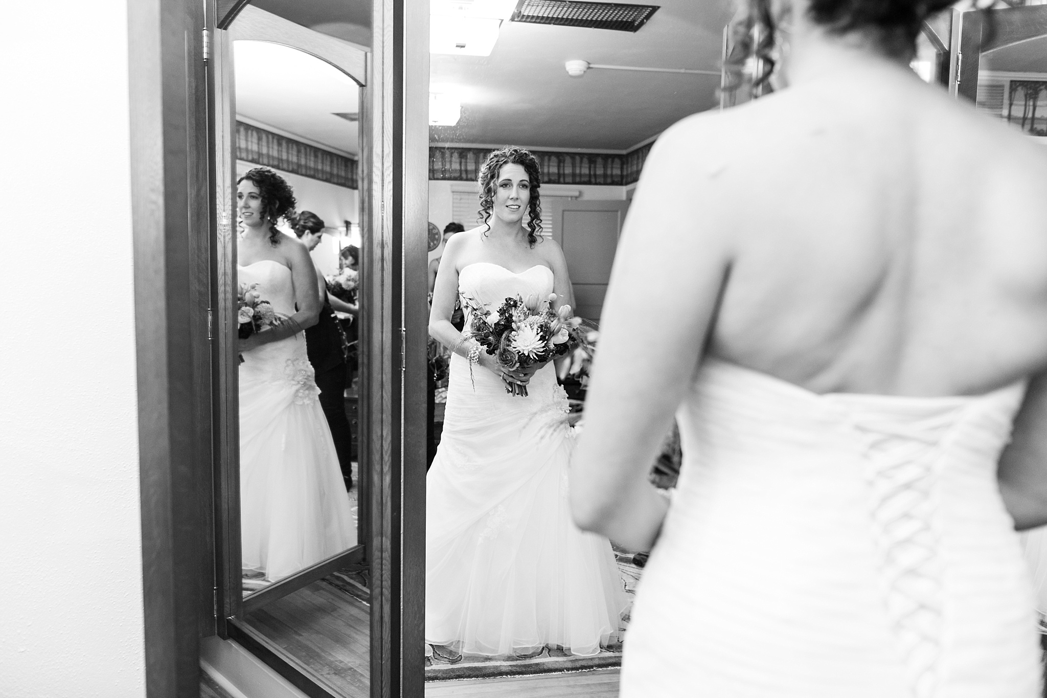 Bride seeing herself in the mirror. Kellie & Brian’s Colorado Mountain Wedding at the historic Boettcher Mansion by Colorado Wedding Photographer, Jennifer Garza. Colorado Wedding Photographer, Colorado Wedding Photography, Colorado Mountain Wedding Photographer, Colorado Mountain Wedding, Mountain Wedding Photographer, Boettcher Mansion Wedding Photographer, Boettcher Mansion Wedding, Mountain Wedding, Lookout Mountain Wedding Photographer, Golden Wedding Photographer, Colorado Bride