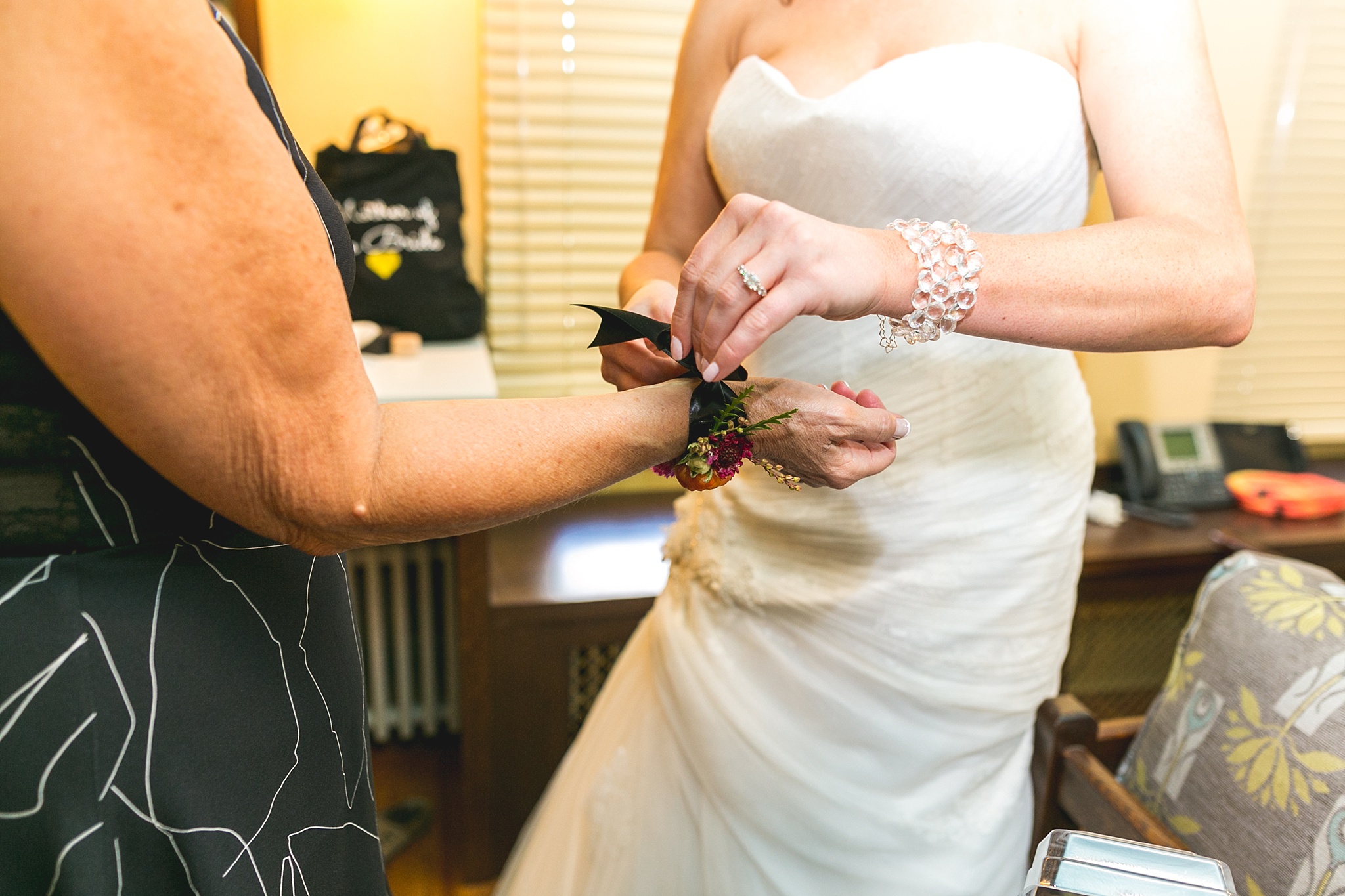 Bride putting corsage on her mother. Kellie & Brian’s Colorado Mountain Wedding at the historic Boettcher Mansion by Colorado Wedding Photographer, Jennifer Garza. Colorado Wedding Photographer, Colorado Wedding Photography, Colorado Mountain Wedding Photographer, Colorado Mountain Wedding, Mountain Wedding Photographer, Boettcher Mansion Wedding Photographer, Boettcher Mansion Wedding, Mountain Wedding, Lookout Mountain Wedding Photographer, Golden Wedding Photographer, Colorado Bride