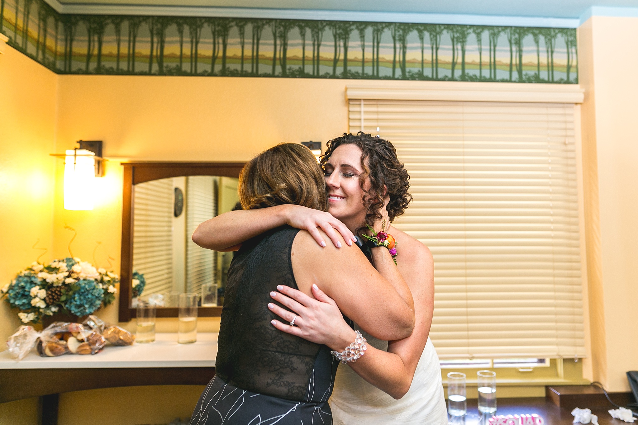 Bride and her mother hugging. Kellie & Brian’s Colorado Mountain Wedding at the historic Boettcher Mansion by Colorado Wedding Photographer, Jennifer Garza. Colorado Wedding Photographer, Colorado Wedding Photography, Colorado Mountain Wedding Photographer, Colorado Mountain Wedding, Mountain Wedding Photographer, Boettcher Mansion Wedding Photographer, Boettcher Mansion Wedding, Mountain Wedding, Lookout Mountain Wedding Photographer, Golden Wedding Photographer, Colorado Bride