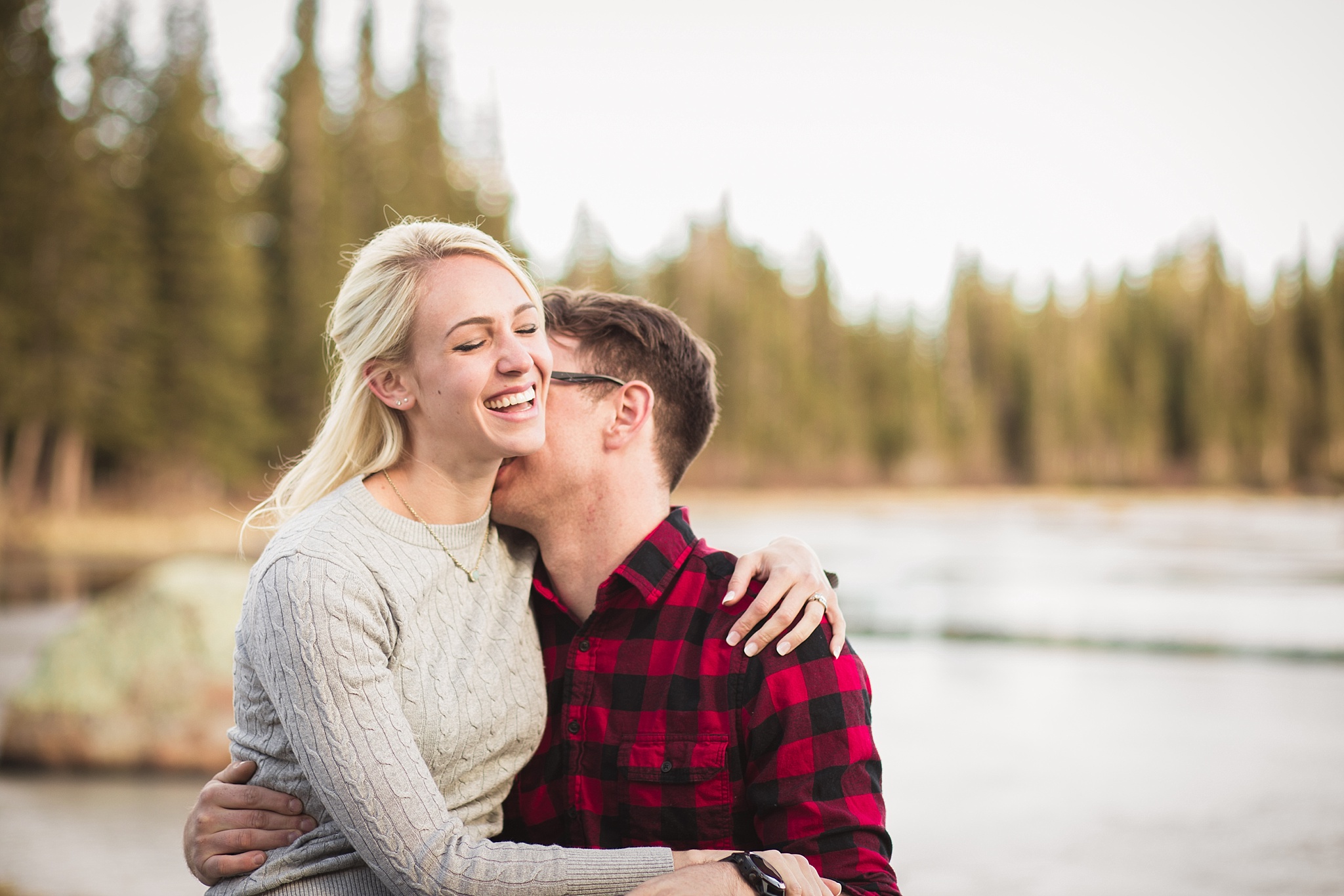 Man kissing his fiancé playfully during their mountain engagement session. Amy & Jonathan’s Brainard Lake Winter Engagement Session by Colorado Engagement Photographer, Jennifer Garza. Colorado Engagement Photographer, Colorado Engagement Photography, Brainard Lake Engagement Session, Brainard Lake Engagement Photos, Mountain Engagement Session, Colorado Winter Engagement Photos, Winter Engagement Photography, Mountain Engagement Photographer, Colorado Wedding, Colorado Bride