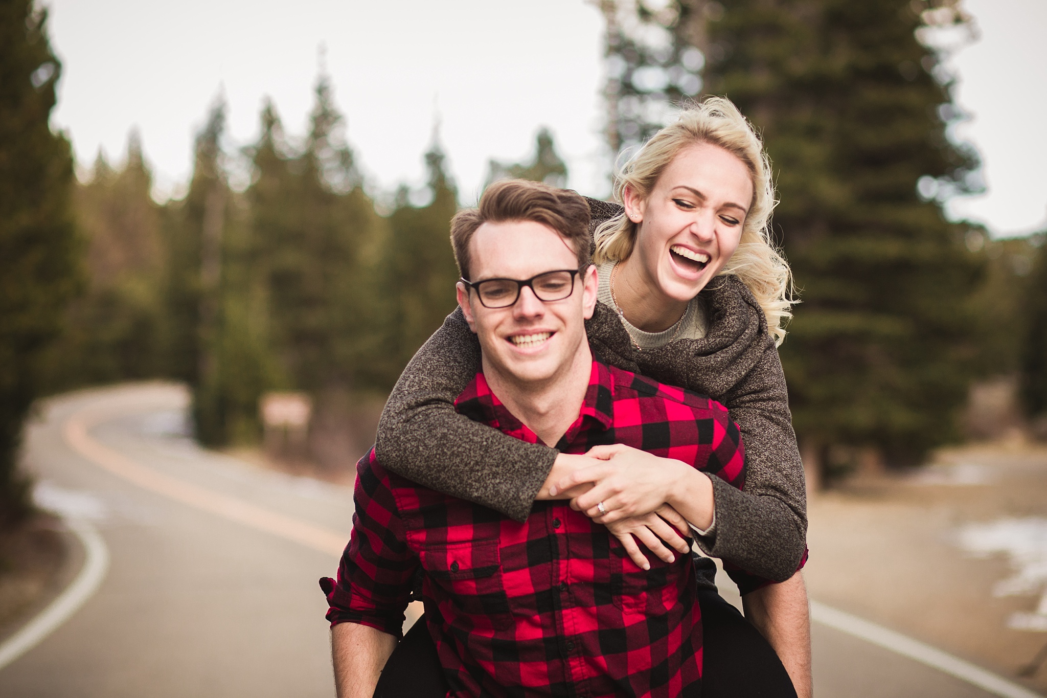 Man giving his fiancé a piggyback ride during their mountain engagement session. Amy & Jonathan’s Brainard Lake Winter Engagement Session by Colorado Engagement Photographer, Jennifer Garza. Colorado Engagement Photographer, Colorado Engagement Photography, Brainard Lake Engagement Session, Brainard Lake Engagement Photos, Mountain Engagement Session, Colorado Winter Engagement Photos, Winter Engagement Photography, Mountain Engagement Photographer, Colorado Wedding, Colorado Bride, MagMod