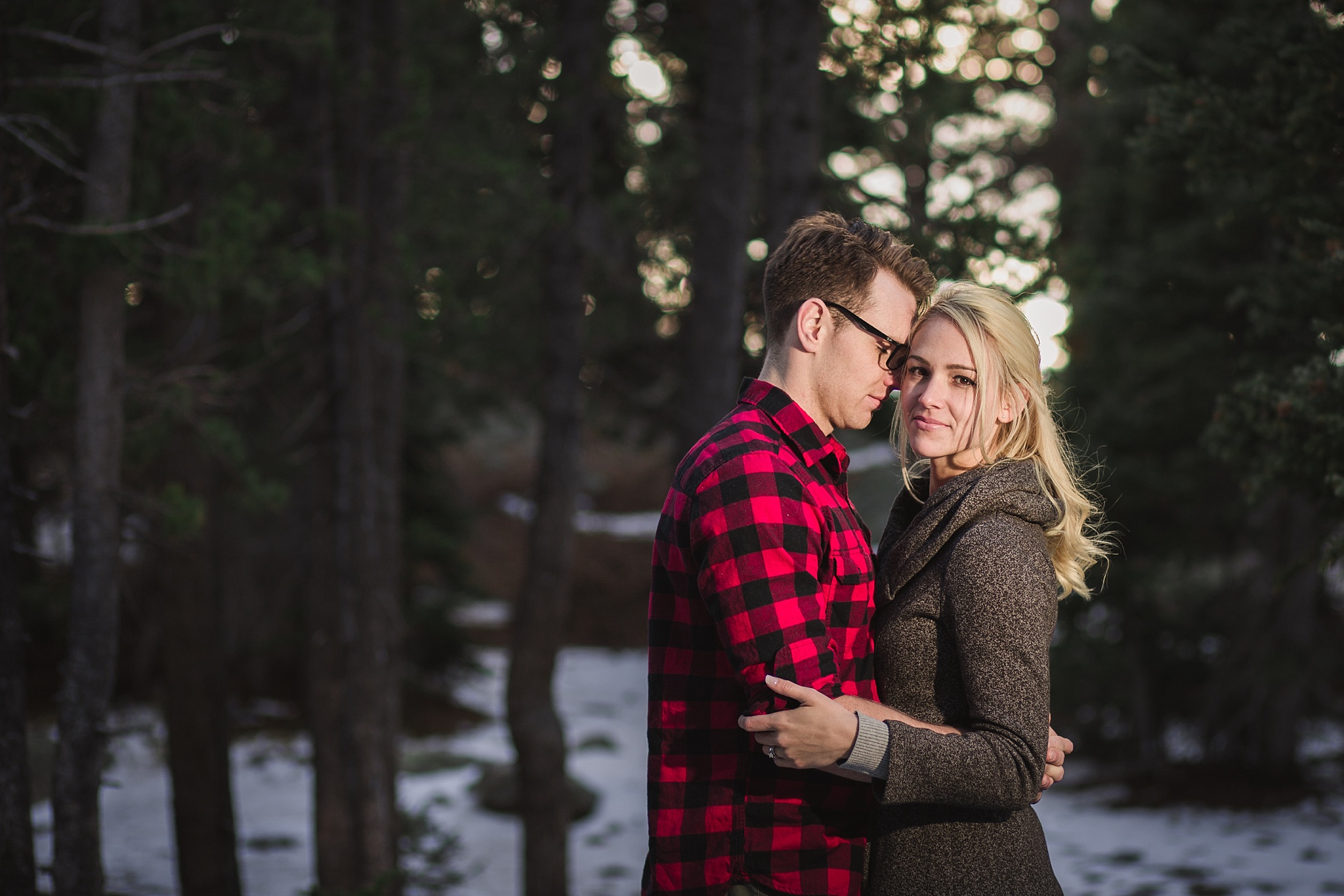 Couple embracing during their mountain engagement session. Amy & Jonathan’s Brainard Lake Winter Engagement Session by Colorado Engagement Photographer, Jennifer Garza. Colorado Engagement Photographer, Colorado Engagement Photography, Brainard Lake Engagement Session, Brainard Lake Engagement Photos, Mountain Engagement Session, Colorado Winter Engagement Photos, Winter Engagement Photography, Mountain Engagement Photographer, Colorado Wedding, Colorado Bride, MagMod