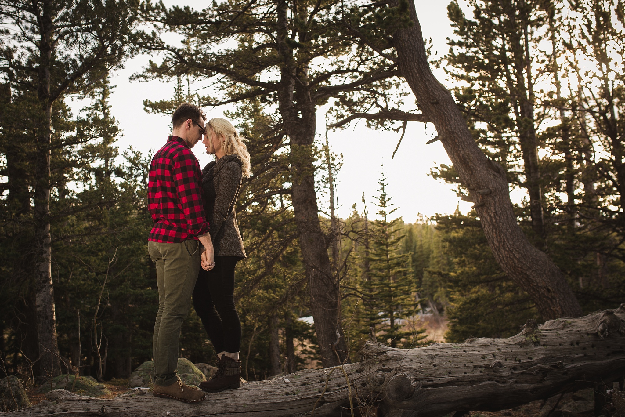 Couple embracing at sunset during a couple’s mountain engagement session. Amy & Jonathan’s Brainard Lake Winter Engagement Session by Colorado Engagement Photographer, Jennifer Garza. Colorado Engagement Photographer, Colorado Engagement Photography, Brainard Lake Engagement Session, Brainard Lake Engagement Photos, Mountain Engagement Session, Colorado Winter Engagement Photos, Winter Engagement Photography, Mountain Engagement Photographer, Colorado Wedding, Colorado Bride, MagMod