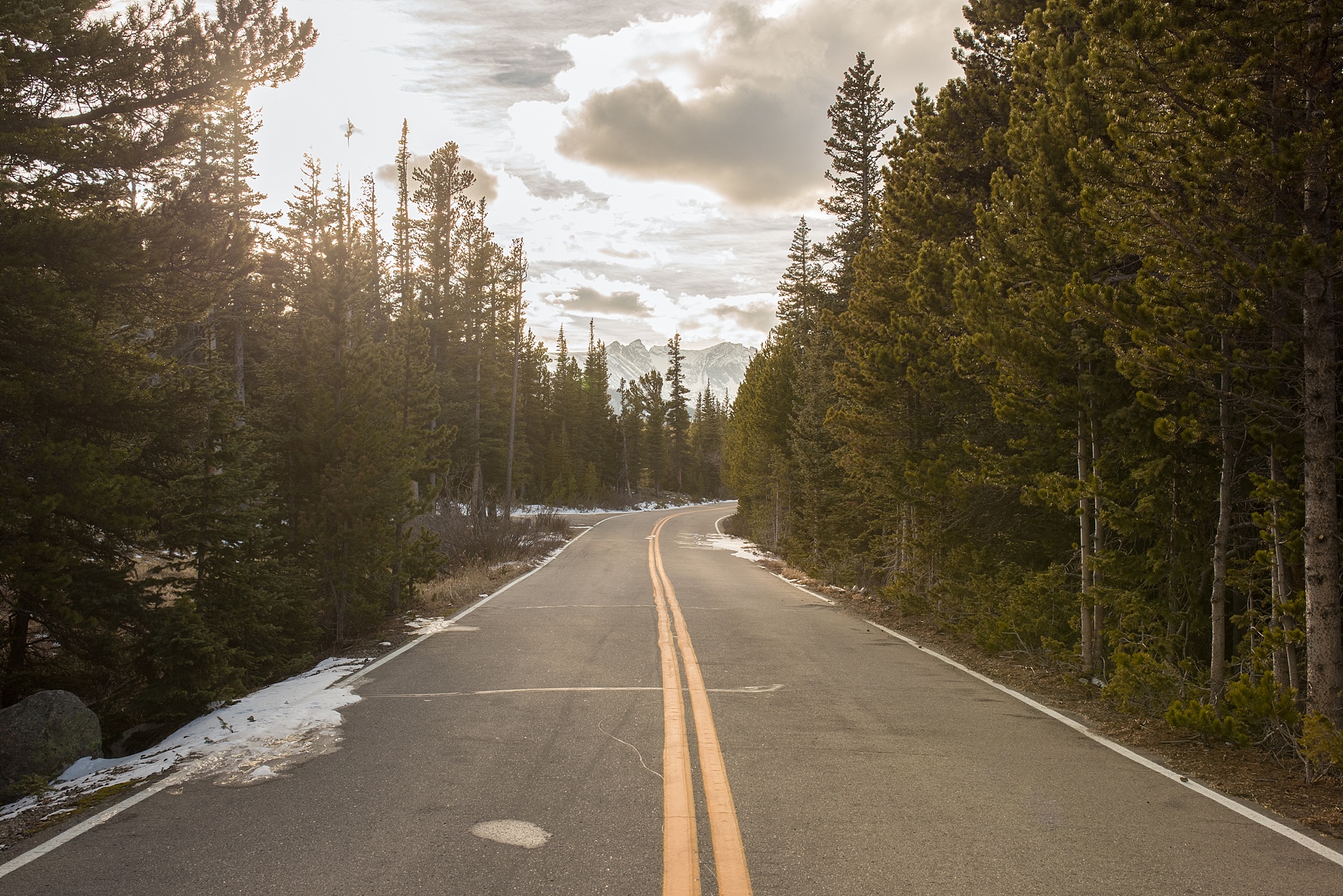 Road with mountain scenery during a couple’s mountain engagement session. Amy & Jonathan’s Brainard Lake Winter Engagement Session by Colorado Engagement Photographer, Jennifer Garza. Colorado Engagement Photographer, Colorado Engagement Photography, Brainard Lake Engagement Session, Brainard Lake Engagement Photos, Mountain Engagement Session, Colorado Winter Engagement Photos, Winter Engagement Photography, Mountain Engagement Photographer, Colorado Wedding, Colorado Bride, MagMod