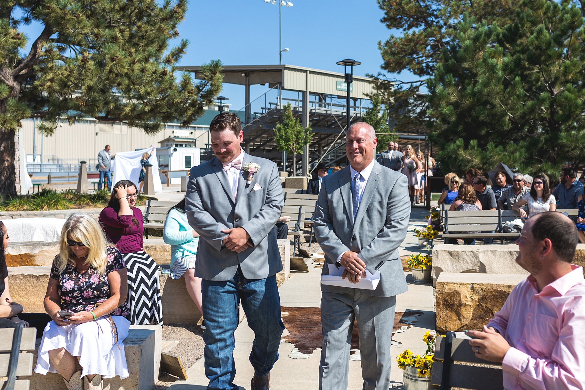 Groom walking down the aisle at the beginning of the ceremony. Katie & Jake’s Castle Rock Wedding at the Douglas County Fairgrounds by Colorado Wedding Photographer, Jennifer Garza. Colorado Wedding Photographer, Colorado Wedding Photography, Douglas County Fairgrounds Wedding Photography, Castle Rock Wedding Photography, Castle Rock Wedding Photographer, Colorado Wedding Photography, Colorado Wedding Photographer, Colorado Wedding, Rustic Wedding, Colorado Bride, Rocky Mountain Bride