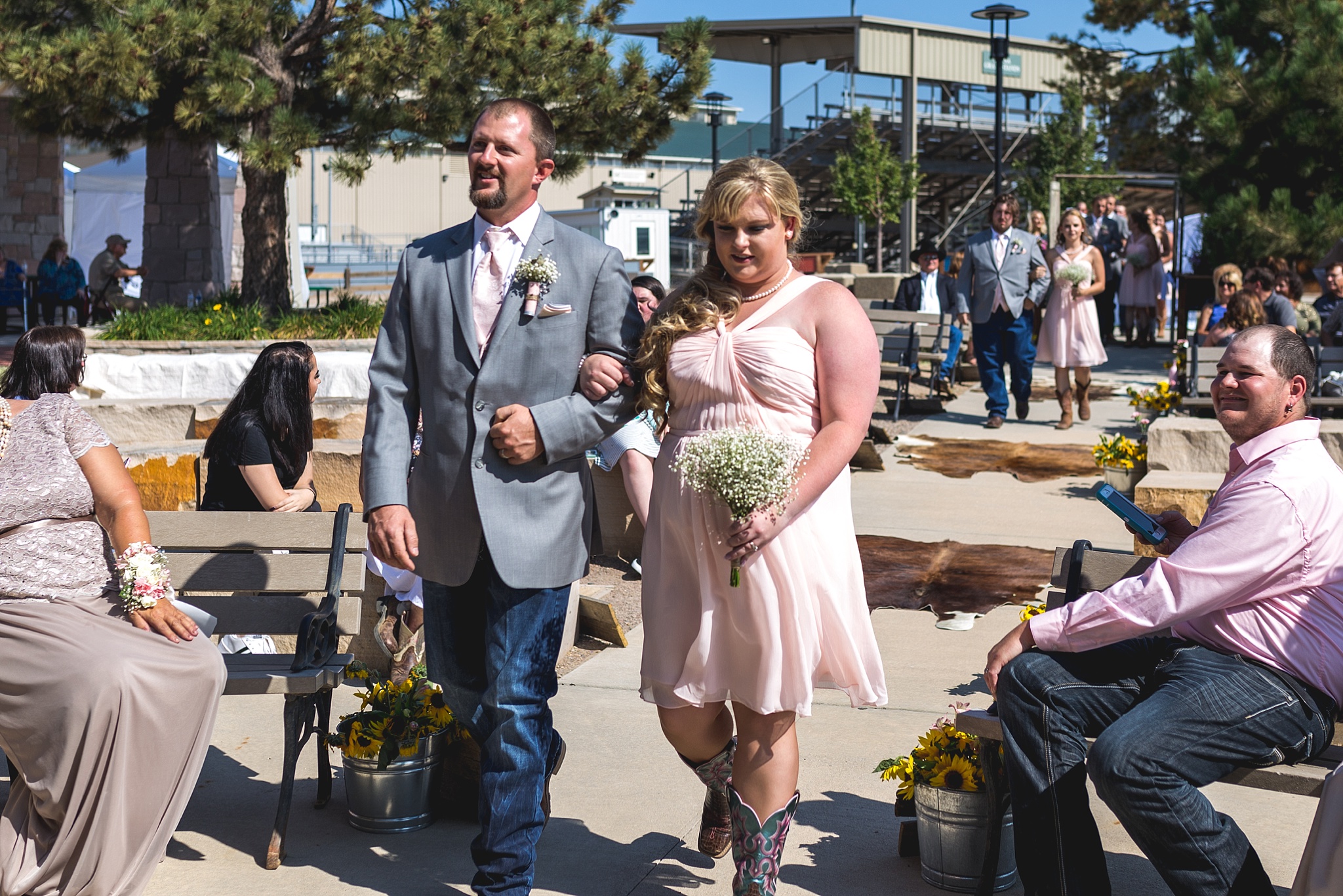 Bridal Party walking down the aisle. Katie & Jake’s Castle Rock Wedding at the Douglas County Fairgrounds by Colorado Wedding Photographer, Jennifer Garza. Colorado Wedding Photographer, Colorado Wedding Photography, Douglas County Fairgrounds Wedding Photography, Castle Rock Wedding Photography, Castle Rock Wedding Photographer, Colorado Wedding Photography, Colorado Wedding Photographer, Colorado Wedding, Rustic Wedding, Colorado Bride, Rocky Mountain Bride