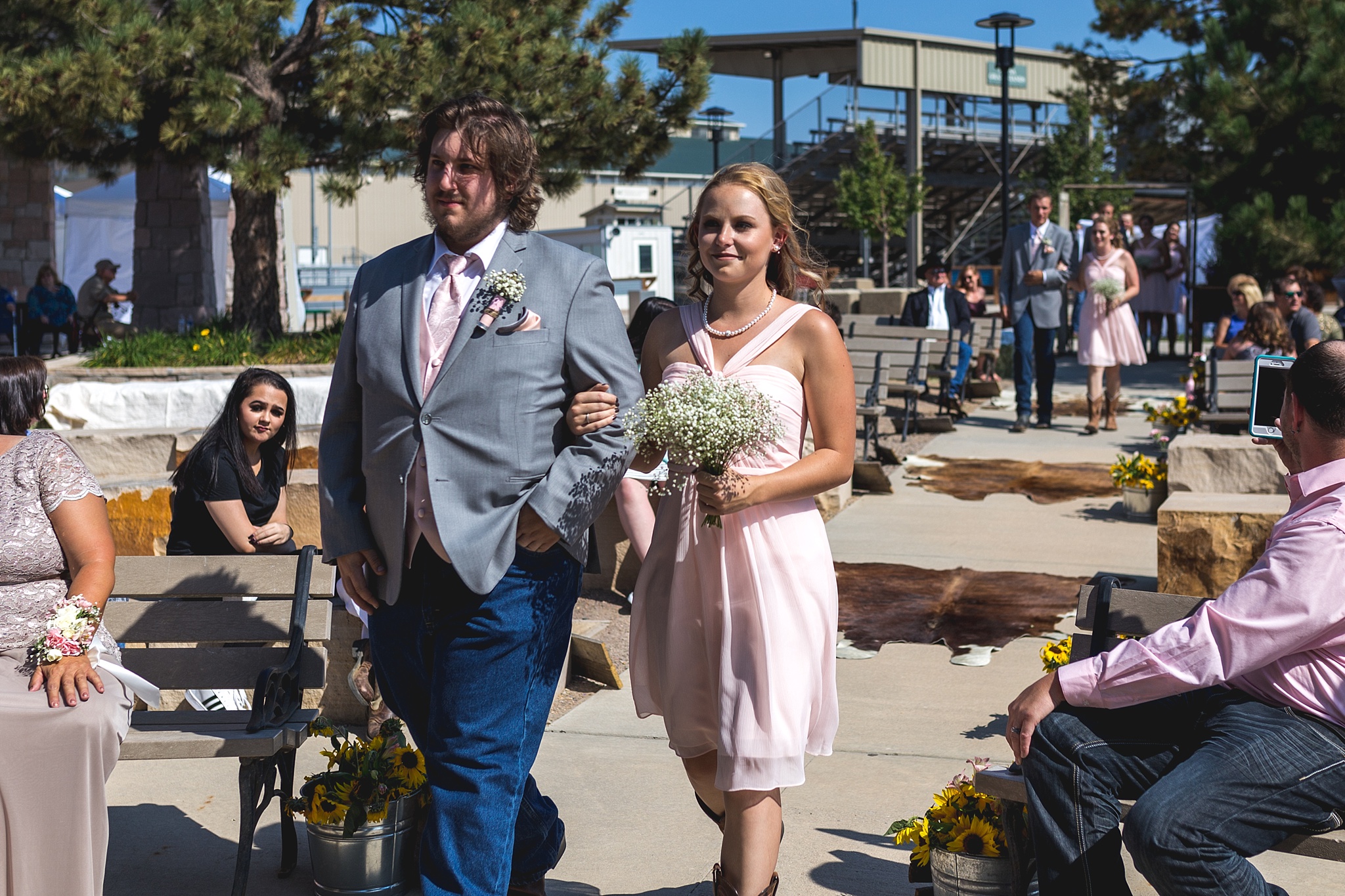 Bridal Party walking down the aisle. Katie & Jake’s Castle Rock Wedding at the Douglas County Fairgrounds by Colorado Wedding Photographer, Jennifer Garza. Colorado Wedding Photographer, Colorado Wedding Photography, Douglas County Fairgrounds Wedding Photography, Castle Rock Wedding Photography, Castle Rock Wedding Photographer, Colorado Wedding Photography, Colorado Wedding Photographer, Colorado Wedding, Rustic Wedding, Colorado Bride, Rocky Mountain Bride