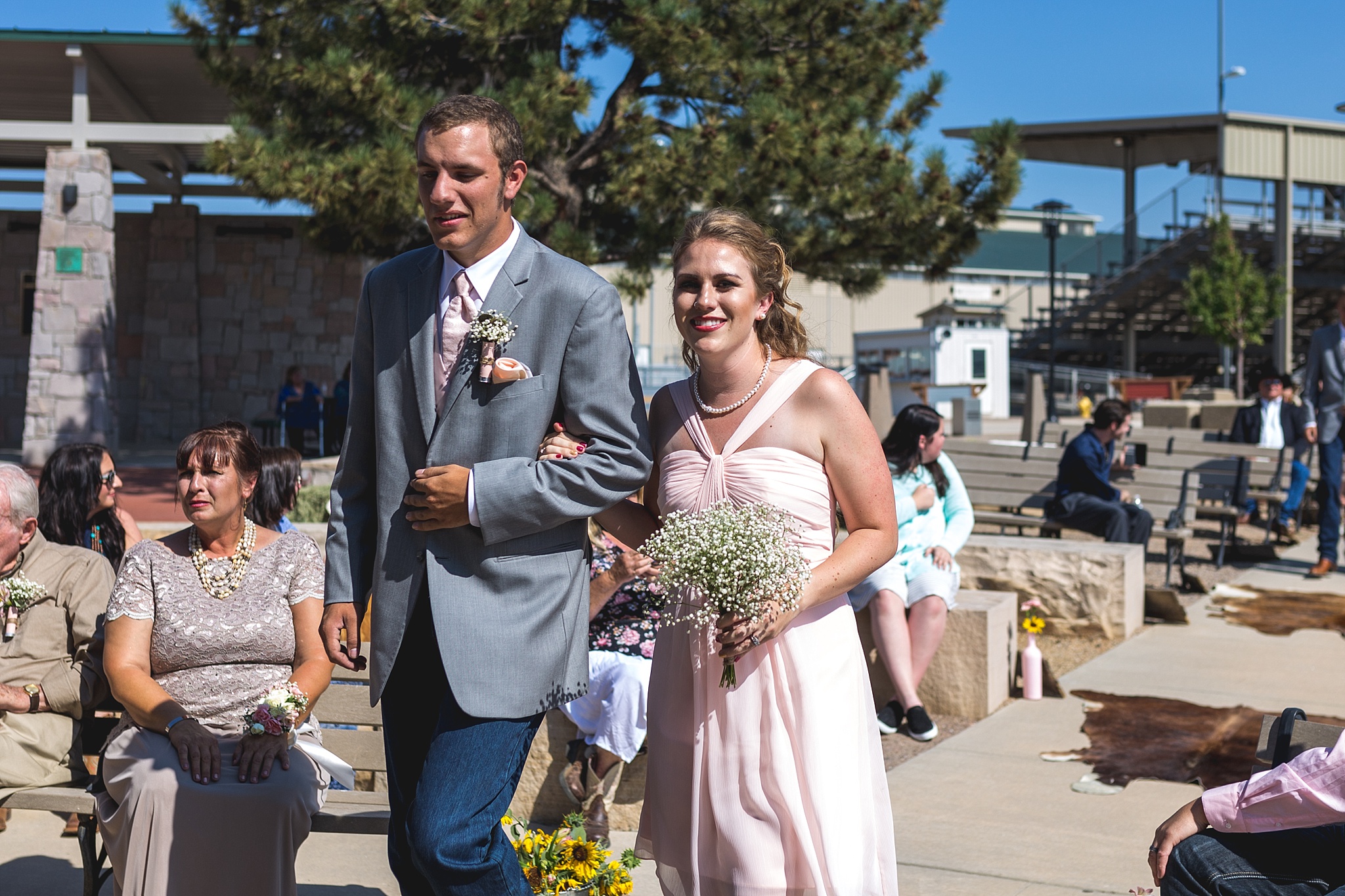 Bridal Party walking down the aisle. Katie & Jake’s Castle Rock Wedding at the Douglas County Fairgrounds by Colorado Wedding Photographer, Jennifer Garza. Colorado Wedding Photographer, Colorado Wedding Photography, Douglas County Fairgrounds Wedding Photography, Castle Rock Wedding Photography, Castle Rock Wedding Photographer, Colorado Wedding Photography, Colorado Wedding Photographer, Colorado Wedding, Rustic Wedding, Colorado Bride, Rocky Mountain Bride