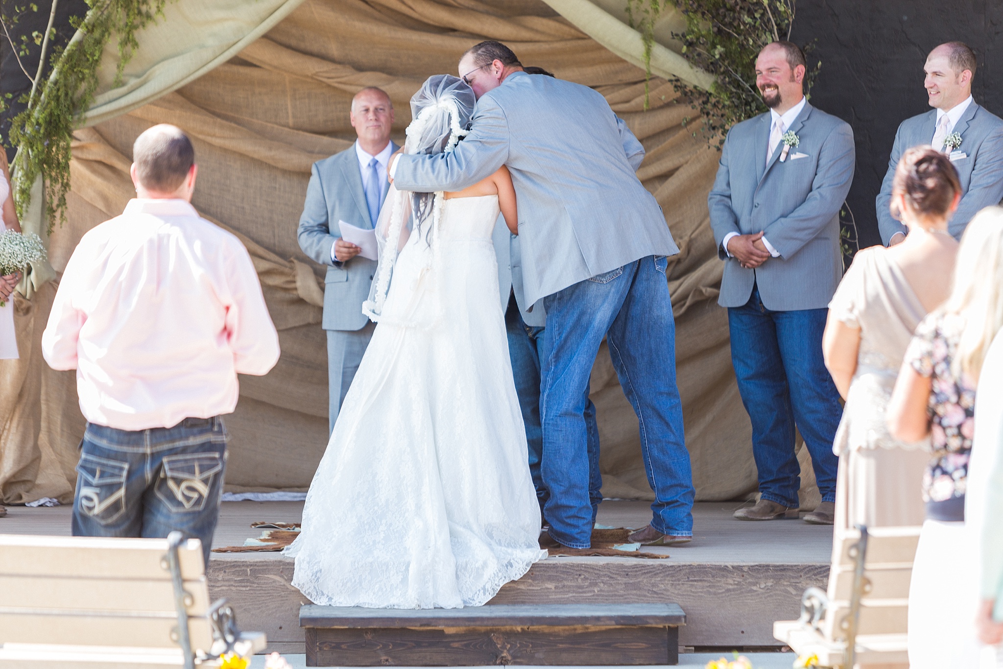 Bride’s father her away at the beginning of the ceremony. Katie & Jake’s Castle Rock Wedding at the Douglas County Fairgrounds by Colorado Wedding Photographer, Jennifer Garza. Colorado Wedding Photographer, Colorado Wedding Photography, Douglas County Fairgrounds Wedding Photography, Castle Rock Wedding Photography, Castle Rock Wedding Photographer, Colorado Wedding Photography, Colorado Wedding Photographer, Colorado Wedding, Rustic Wedding, Colorado Bride, Rocky Mountain Bride