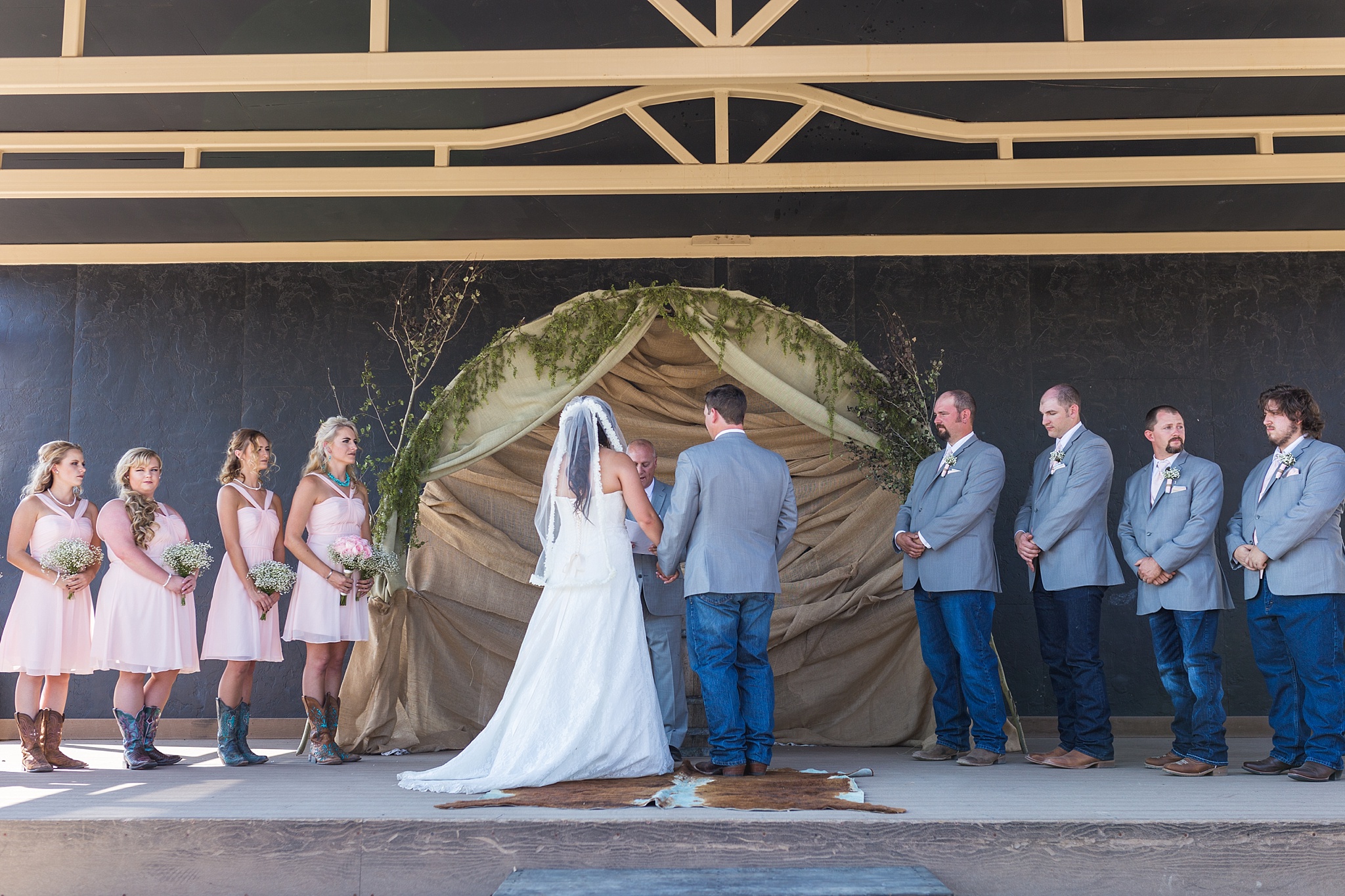 Bride & Groom exchanging vows during the ceremony. Katie & Jake’s Castle Rock Wedding at the Douglas County Fairgrounds by Colorado Wedding Photographer, Jennifer Garza. Colorado Wedding Photographer, Colorado Wedding Photography, Douglas County Fairgrounds Wedding Photography, Castle Rock Wedding Photography, Castle Rock Wedding Photographer, Colorado Wedding Photography, Colorado Wedding Photographer, Colorado Wedding, Rustic Wedding, Colorado Bride, Rocky Mountain Bride