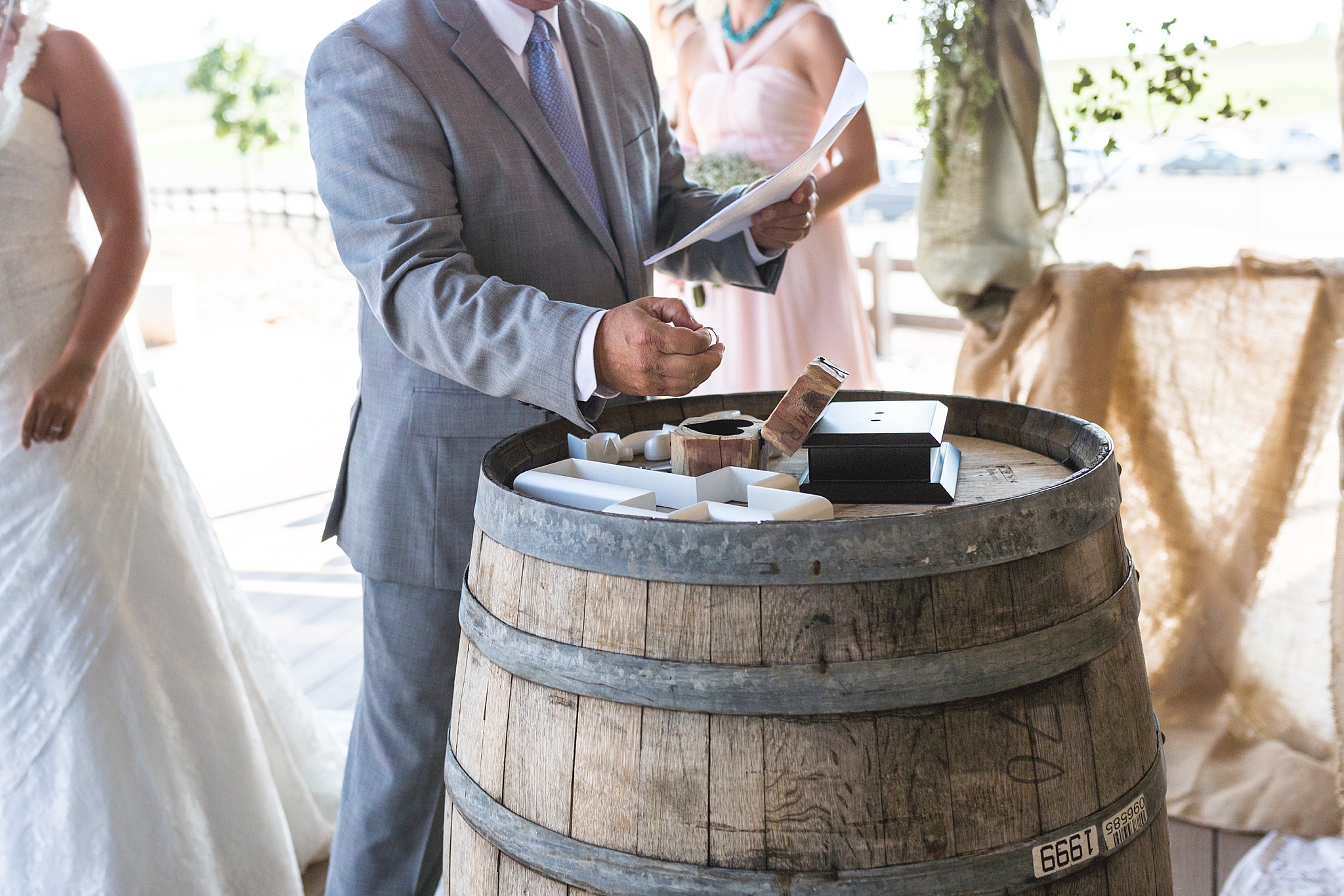 Bride & Groom exchanging rings during the ceremony. Katie & Jake’s Castle Rock Wedding at the Douglas County Fairgrounds by Colorado Wedding Photographer, Jennifer Garza. Colorado Wedding Photographer, Colorado Wedding Photography, Douglas County Fairgrounds Wedding Photography, Castle Rock Wedding Photography, Castle Rock Wedding Photographer, Colorado Wedding Photography, Colorado Wedding Photographer, Colorado Wedding, Rustic Wedding, Colorado Bride, Rocky Mountain Bride