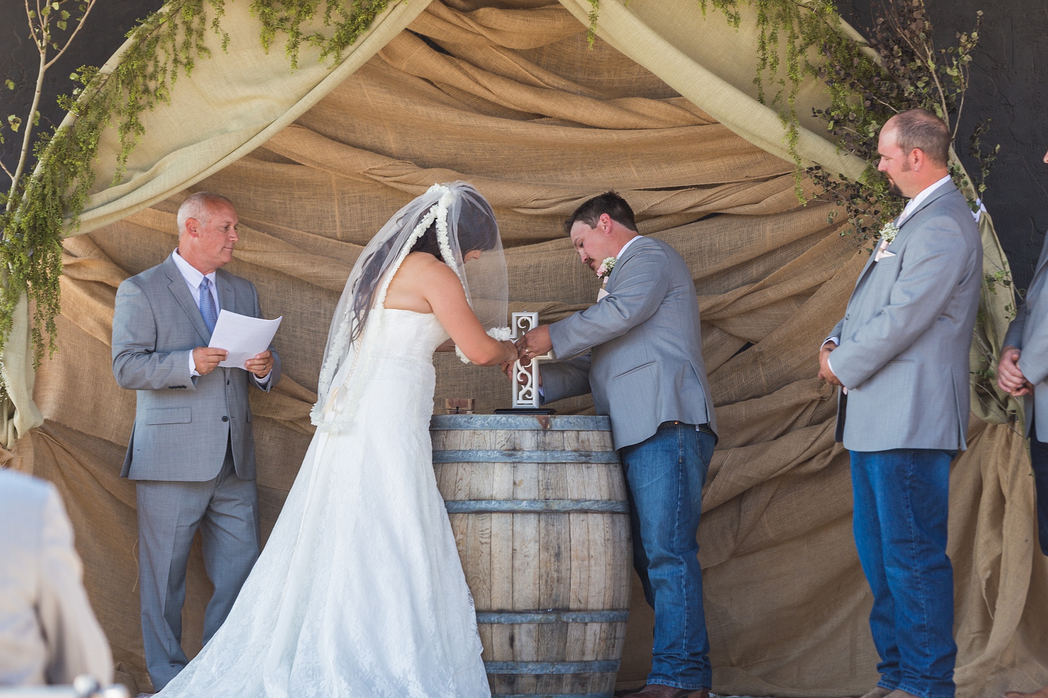 Bride & Groom assembling a cross during the ceremony. Katie & Jake’s Castle Rock Wedding at the Douglas County Fairgrounds by Colorado Wedding Photographer, Jennifer Garza. Colorado Wedding Photographer, Colorado Wedding Photography, Douglas County Fairgrounds Wedding Photography, Castle Rock Wedding Photography, Castle Rock Wedding Photographer, Colorado Wedding Photography, Colorado Wedding Photographer, Colorado Wedding, Rustic Wedding, Colorado Bride, Rocky Mountain Bride