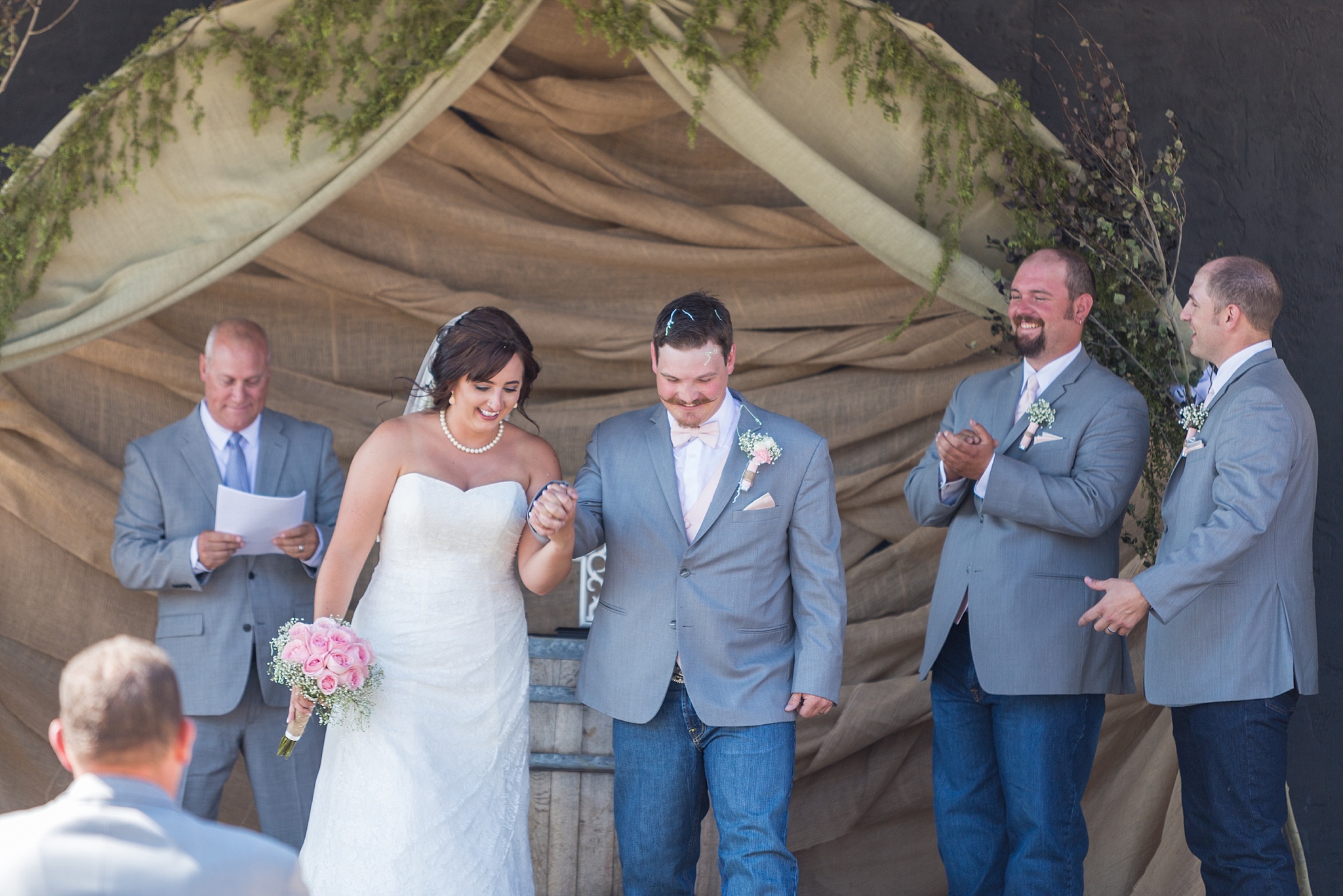 Bride & Groom being announced at the end of the ceremony. Katie & Jake’s Castle Rock Wedding at the Douglas County Fairgrounds by Colorado Wedding Photographer, Jennifer Garza. Colorado Wedding Photographer, Colorado Wedding Photography, Douglas County Fairgrounds Wedding Photography, Castle Rock Wedding Photography, Castle Rock Wedding Photographer, Colorado Wedding Photography, Colorado Wedding Photographer, Colorado Wedding, Rustic Wedding, Colorado Bride, Rocky Mountain Bride