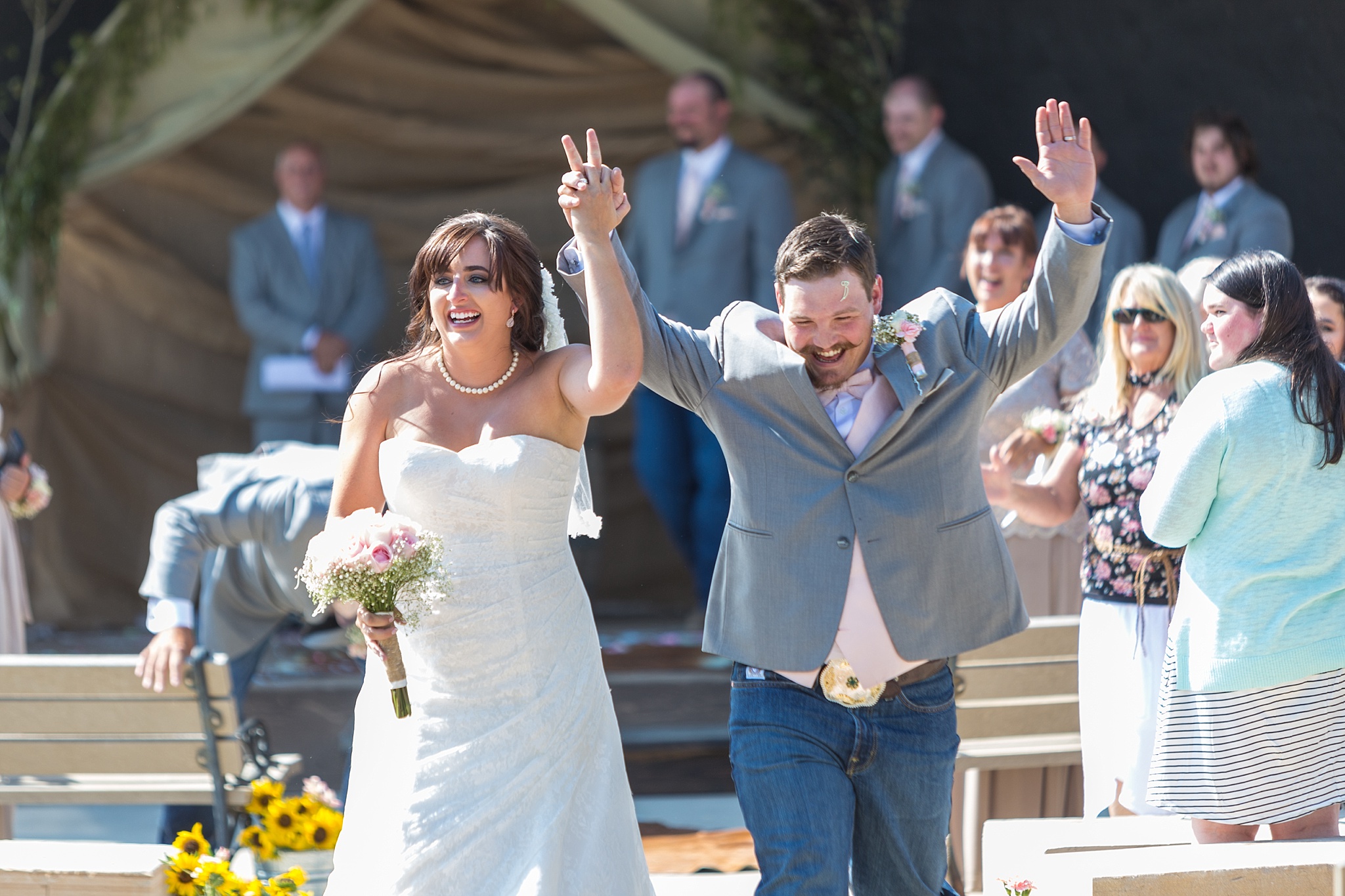 Bride & Groom walking up the aisle. Katie & Jake’s Castle Rock Wedding at the Douglas County Fairgrounds by Colorado Wedding Photographer, Jennifer Garza. Colorado Wedding Photographer, Colorado Wedding Photography, Douglas County Fairgrounds Wedding Photography, Castle Rock Wedding Photography, Castle Rock Wedding Photographer, Colorado Wedding Photography, Colorado Wedding Photographer, Colorado Wedding, Rustic Wedding, Colorado Bride, Rocky Mountain Bride