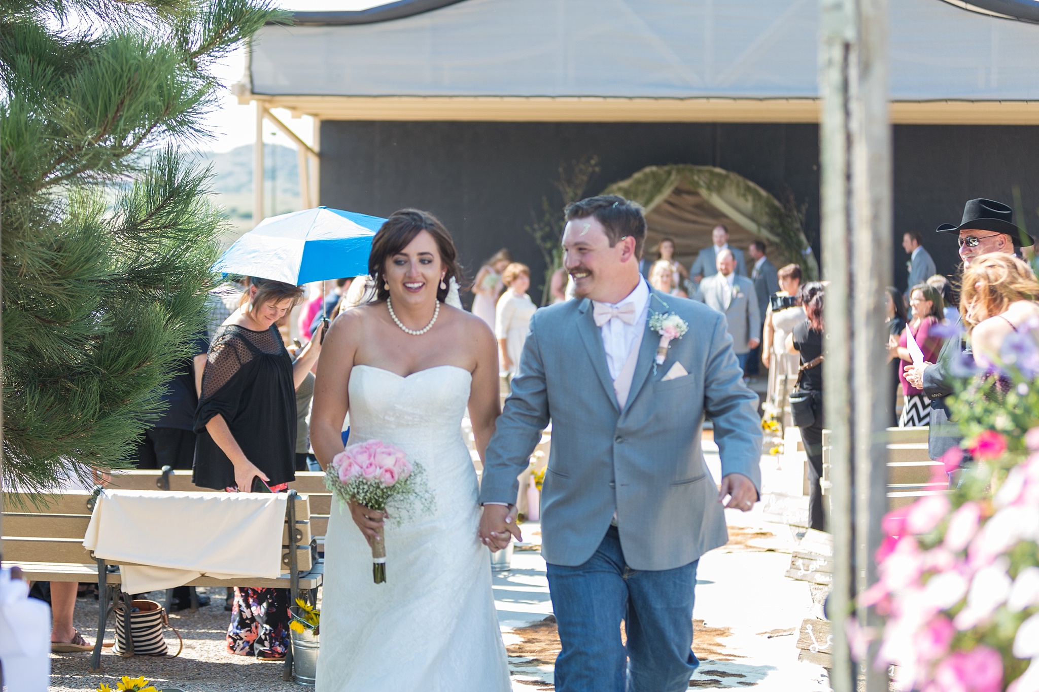 Bride & Groom walking up the aisle. Katie & Jake’s Castle Rock Wedding at the Douglas County Fairgrounds by Colorado Wedding Photographer, Jennifer Garza. Colorado Wedding Photographer, Colorado Wedding Photography, Douglas County Fairgrounds Wedding Photography, Castle Rock Wedding Photography, Castle Rock Wedding Photographer, Colorado Wedding Photography, Colorado Wedding Photographer, Colorado Wedding, Rustic Wedding, Colorado Bride, Rocky Mountain Bride