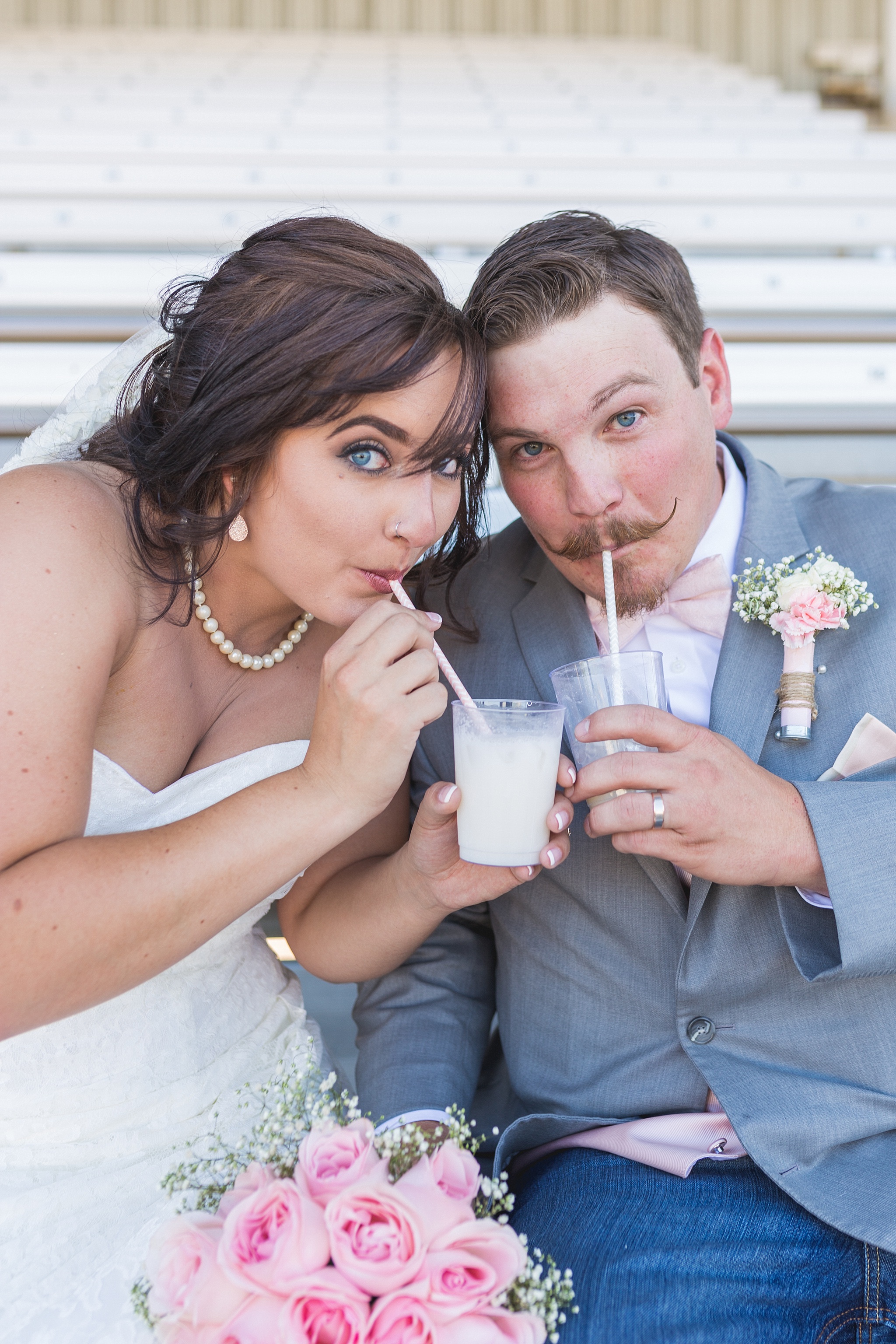 Bride & Groom sipping drinks together. Katie & Jake’s Castle Rock Wedding at the Douglas County Fairgrounds by Colorado Wedding Photographer, Jennifer Garza. Colorado Wedding Photographer, Colorado Wedding Photography, Douglas County Fairgrounds Wedding Photography, Castle Rock Wedding Photography, Castle Rock Wedding Photographer, Colorado Wedding Photography, Colorado Wedding Photographer, Colorado Wedding, Rustic Wedding, Colorado Bride, Rocky Mountain Bride