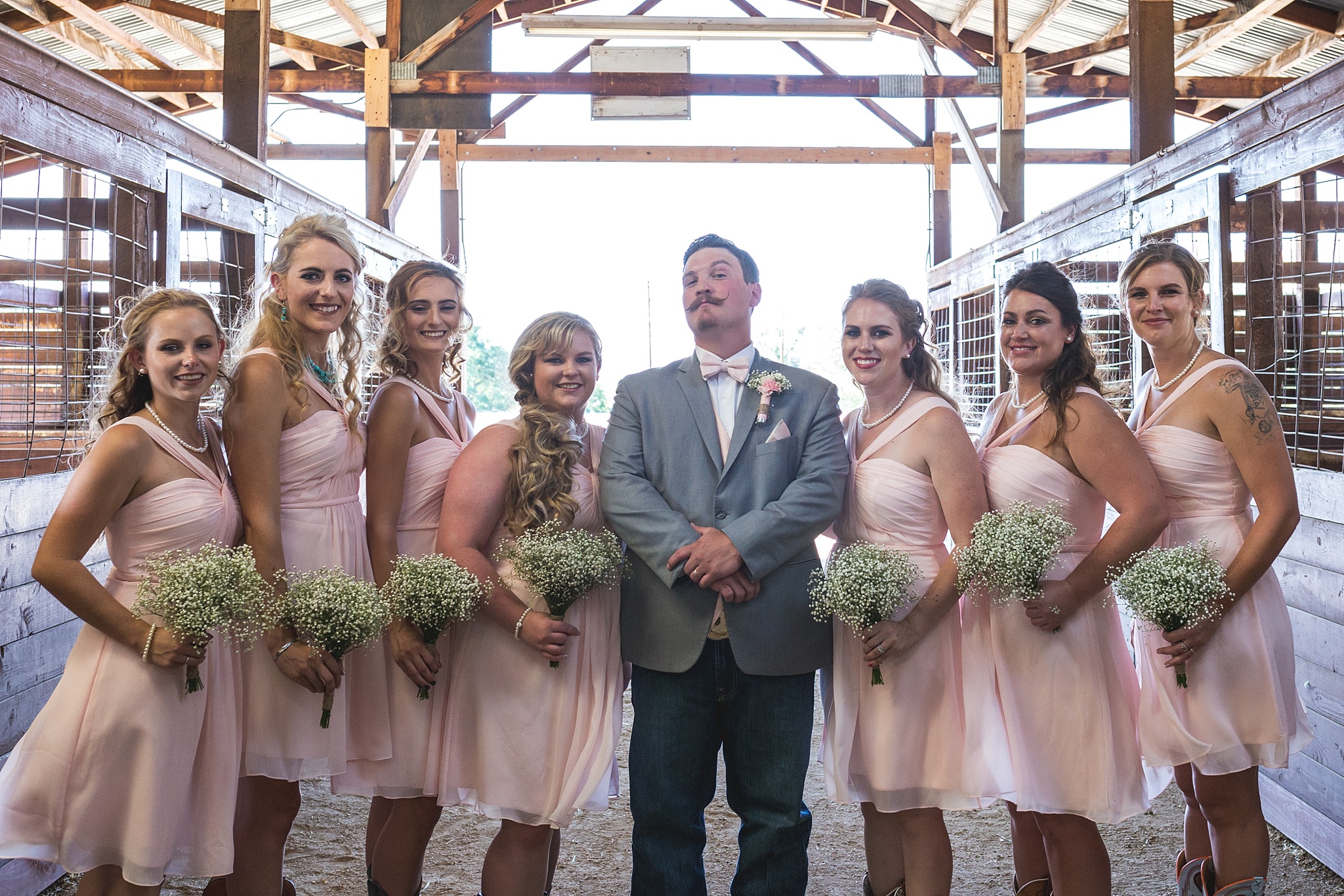 Groom with Bridesmaids portraits. Katie & Jake’s Castle Rock Wedding at the Douglas County Fairgrounds by Colorado Wedding Photographer, Jennifer Garza. Colorado Wedding Photographer, Colorado Wedding Photography, Douglas County Fairgrounds Wedding Photography, Castle Rock Wedding Photography, Castle Rock Wedding Photographer, Colorado Wedding Photography, Colorado Wedding Photographer, Colorado Wedding, Rustic Wedding, Colorado Bride, Rocky Mountain Bride