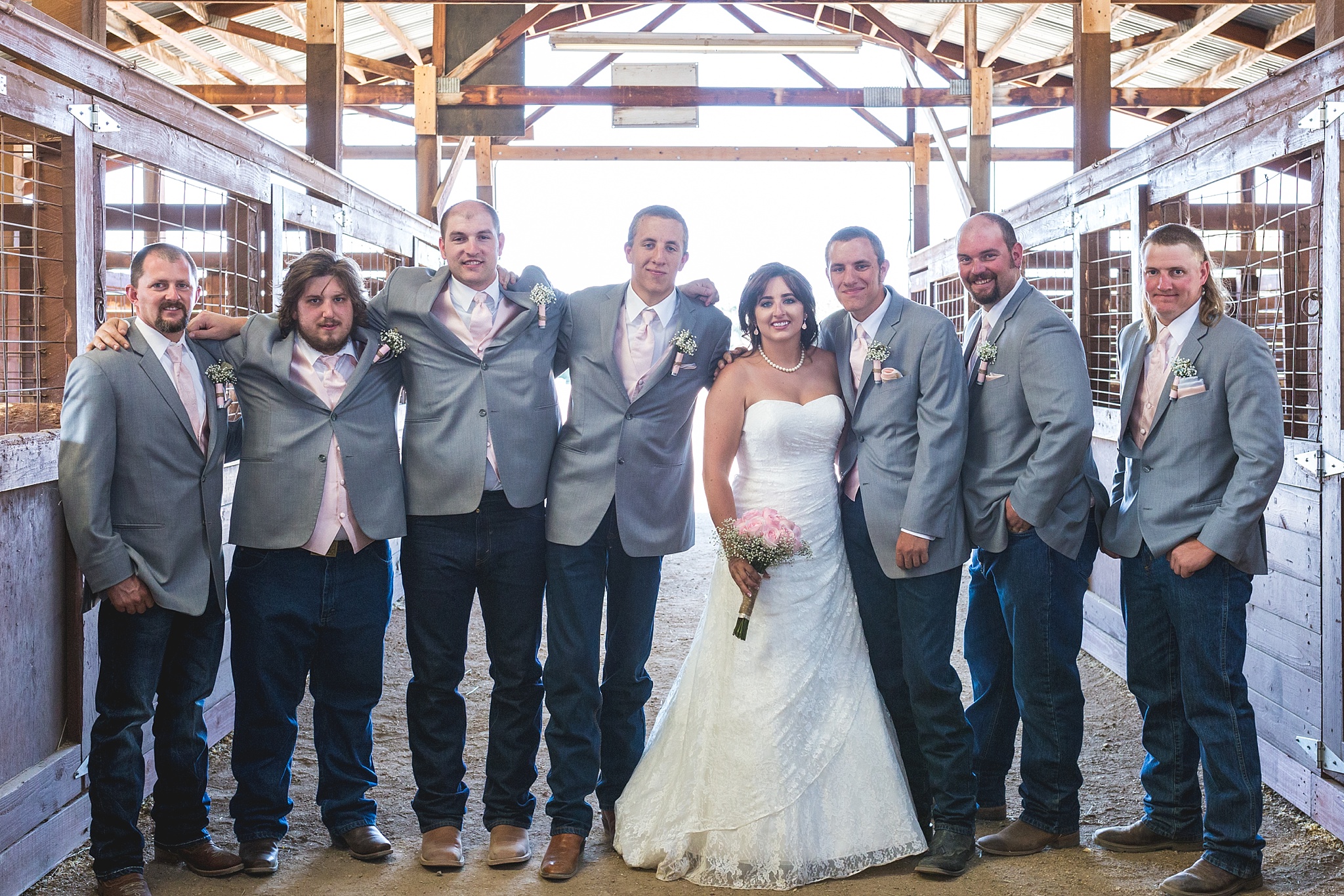 Bride with Groomsmen portraits. Katie & Jake’s Castle Rock Wedding at the Douglas County Fairgrounds by Colorado Wedding Photographer, Jennifer Garza. Colorado Wedding Photographer, Colorado Wedding Photography, Douglas County Fairgrounds Wedding Photography, Castle Rock Wedding Photography, Castle Rock Wedding Photographer, Colorado Wedding Photography, Colorado Wedding Photographer, Colorado Wedding, Rustic Wedding, Colorado Bride, Rocky Mountain Bride