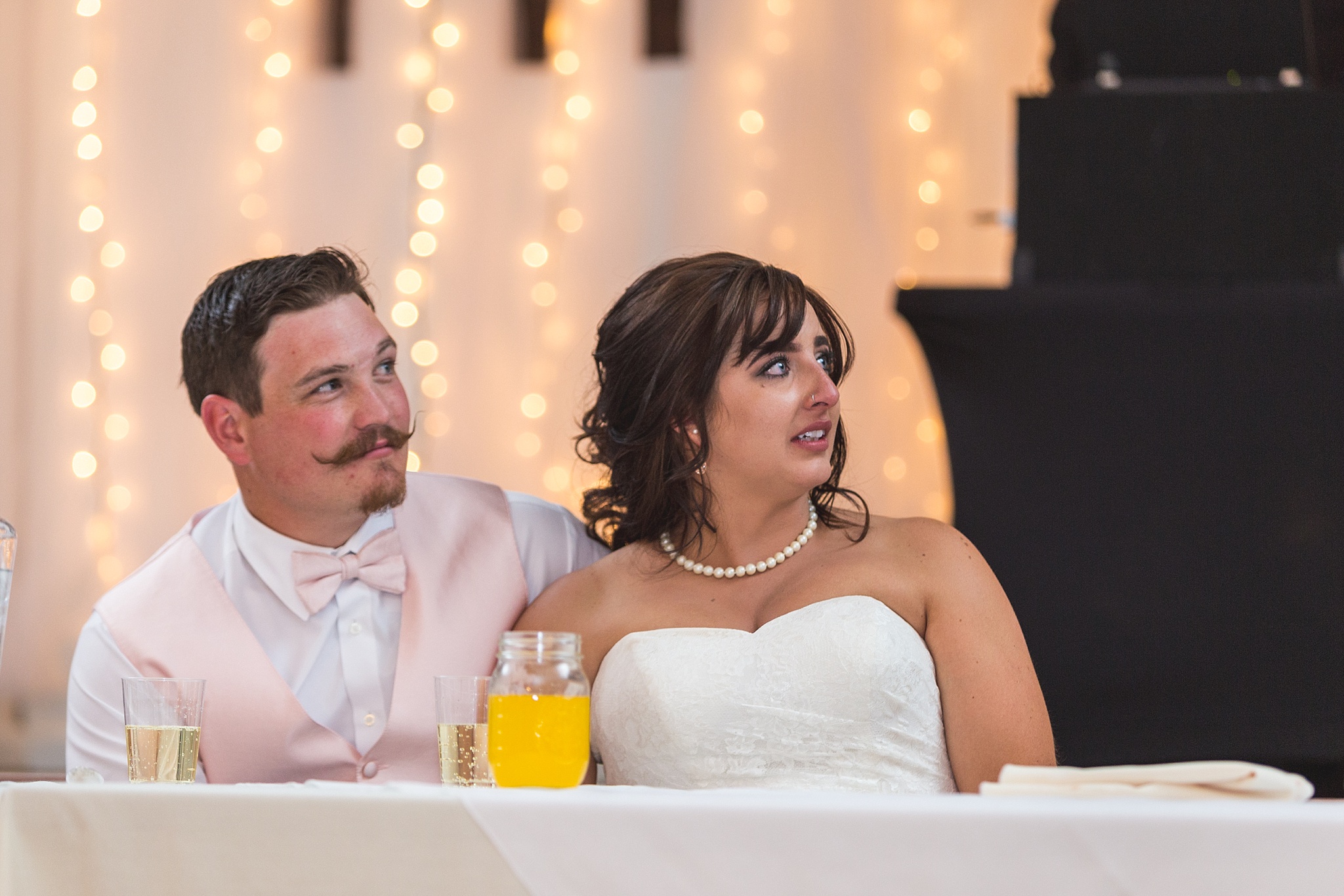 Bride & Groom listening to speeches. Katie & Jake’s Castle Rock Wedding at the Douglas County Fairgrounds by Colorado Wedding Photographer, Jennifer Garza. Colorado Wedding Photographer, Colorado Wedding Photography, Douglas County Fairgrounds Wedding Photography, Castle Rock Wedding Photography, Castle Rock Wedding Photographer, Colorado Wedding Photography, Colorado Wedding Photographer, Colorado Wedding, Rustic Wedding, Colorado Bride, Rocky Mountain Bride