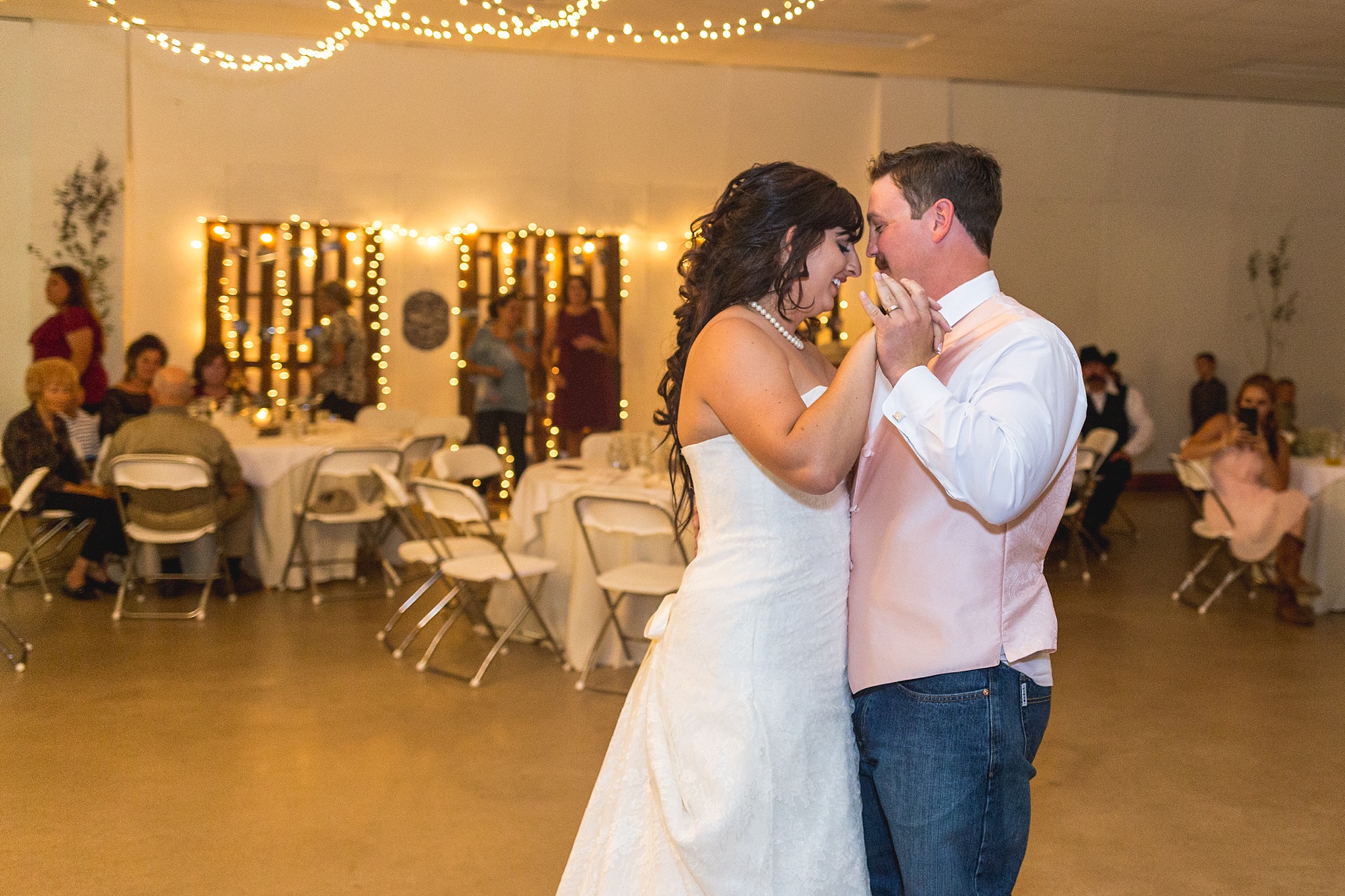 Bride & Groom First Dance during the wedding reception. Katie & Jake’s Castle Rock Wedding at the Douglas County Fairgrounds by Colorado Wedding Photographer, Jennifer Garza. Colorado Wedding Photographer, Colorado Wedding Photography, Douglas County Fairgrounds Wedding Photography, Castle Rock Wedding Photography, Castle Rock Wedding Photographer, Colorado Wedding Photography, Colorado Wedding Photographer, Colorado Wedding, Rustic Wedding, Colorado Bride, Rocky Mountain Bride