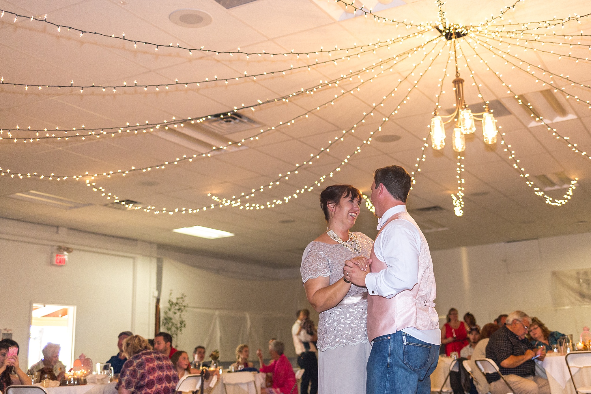 Mother-Son Dance during the wedding reception. Katie & Jake’s Castle Rock Wedding at the Douglas County Fairgrounds by Colorado Wedding Photographer, Jennifer Garza. Colorado Wedding Photographer, Colorado Wedding Photography, Douglas County Fairgrounds Wedding Photography, Castle Rock Wedding Photography, Castle Rock Wedding Photographer, Colorado Wedding Photography, Colorado Wedding Photographer, Colorado Wedding, Rustic Wedding, Colorado Bride, Rocky Mountain Bride