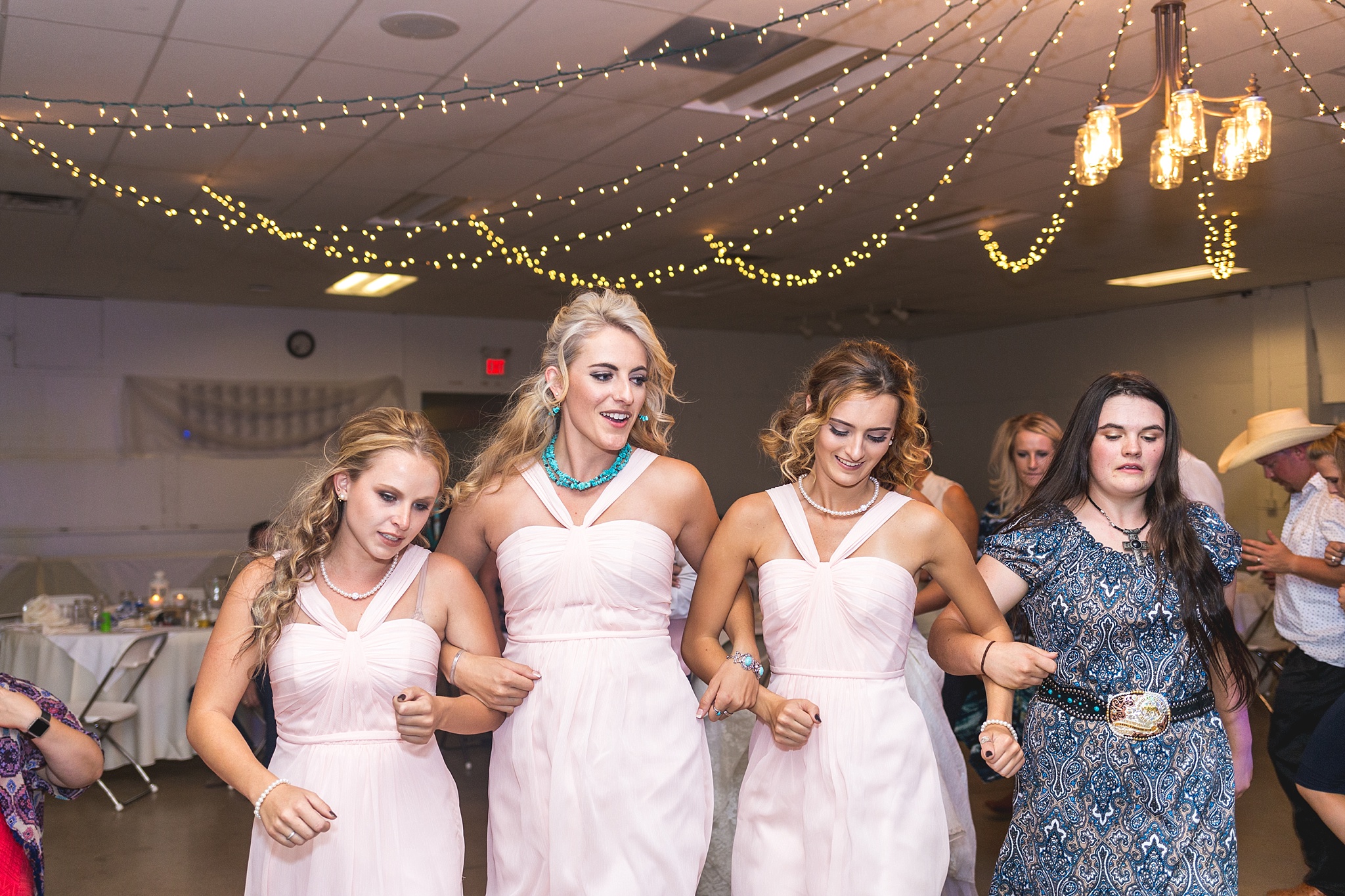 Guests dancing during their wedding reception. Katie & Jake’s Castle Rock Wedding at the Douglas County Fairgrounds by Colorado Wedding Photographer, Jennifer Garza. Colorado Wedding Photographer, Colorado Wedding Photography, Douglas County Fairgrounds Wedding Photography, Castle Rock Wedding Photography, Castle Rock Wedding Photographer, Colorado Wedding Photography, Colorado Wedding Photographer, Colorado Wedding, Rustic Wedding, Colorado Bride, Rocky Mountain Bride