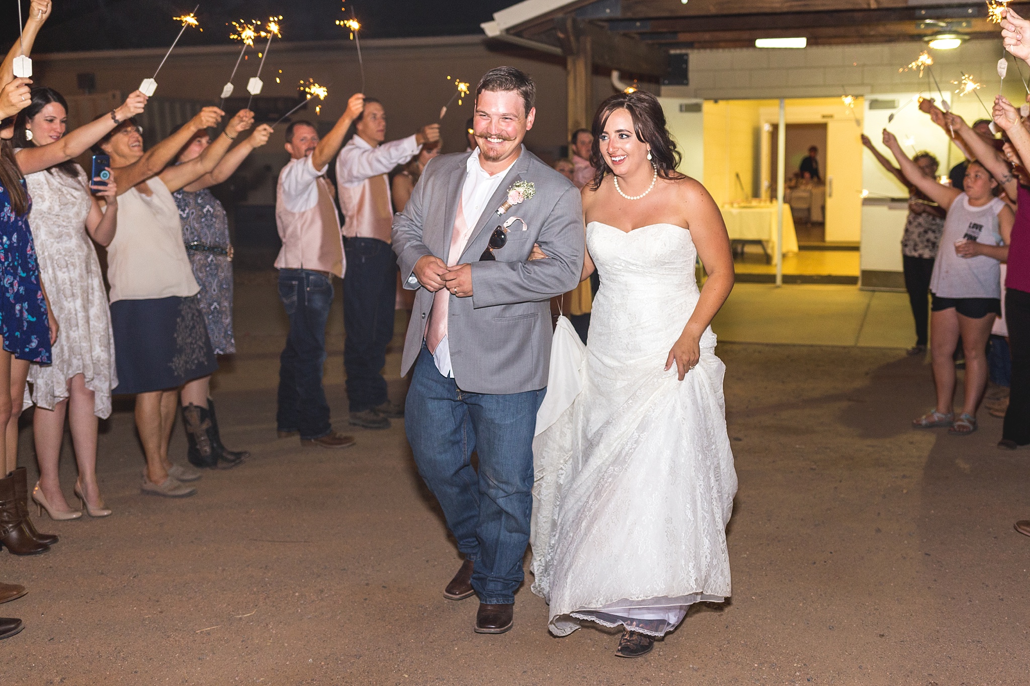 Bride & Groom’s Sparkler Exit. Katie & Jake’s Castle Rock Wedding at the Douglas County Fairgrounds by Colorado Wedding Photographer, Jennifer Garza. Colorado Wedding Photographer, Colorado Wedding Photography, Douglas County Fairgrounds Wedding Photography, Castle Rock Wedding Photography, Castle Rock Wedding Photographer, Colorado Wedding Photography, Colorado Wedding Photographer, Colorado Wedding, Rustic Wedding, Colorado Bride, Rocky Mountain Bride