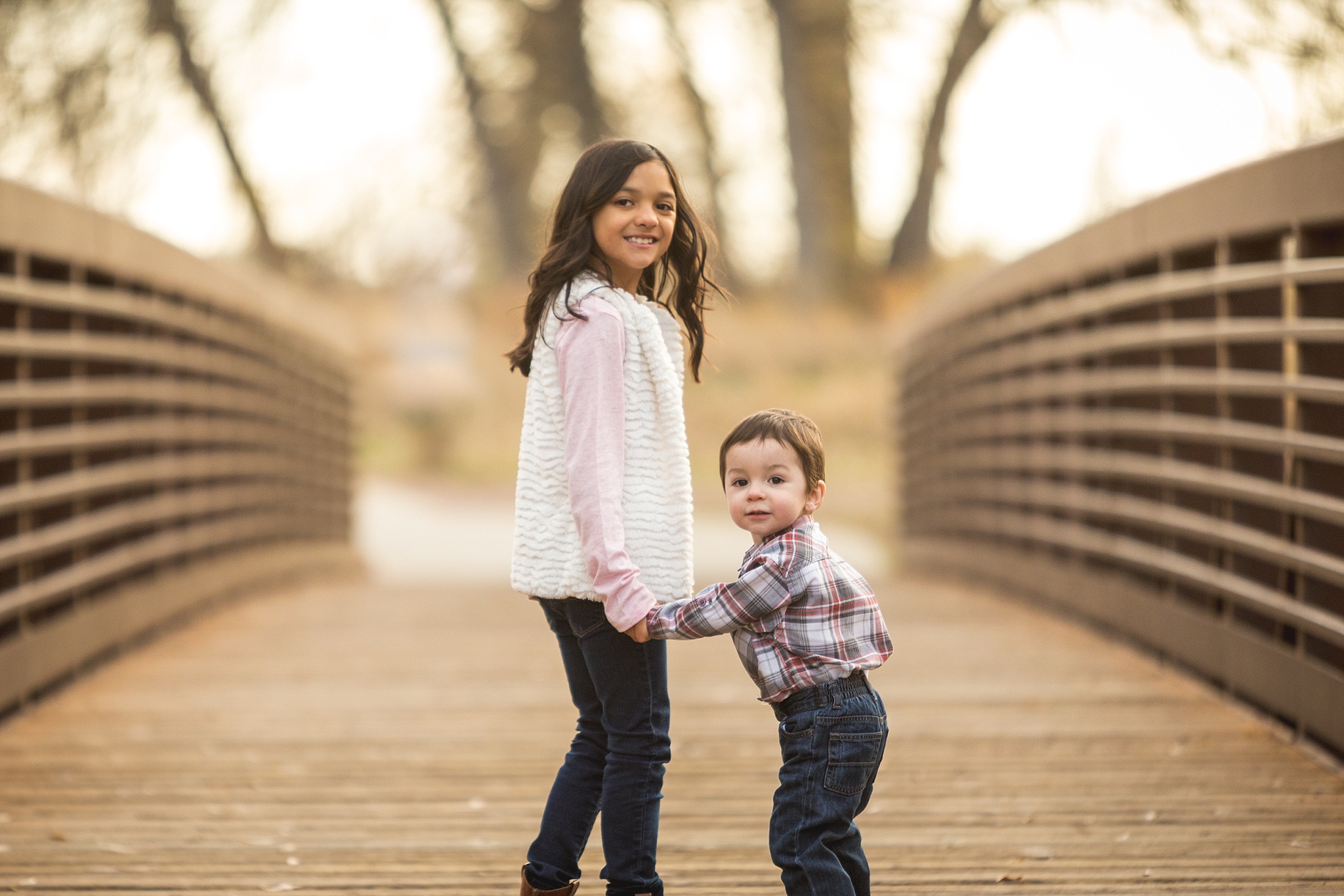 Brother & Sister playing during fall family portraits. The Aguayo Family’s Fall Family Photo Session at Golden Ponds Nature Area by Colorado Family Photographer, Jennifer Garza. Golden Ponds Nature Area Family Photographer, Golden Ponds Nature Area, Golden Ponds, Golden Ponds Family Photographer, Longmont Family Photography, Longmont Family Photographer, Colorado Family Photos, Colorado Family Photographer, Colorado Fall Photos, Fall Photos