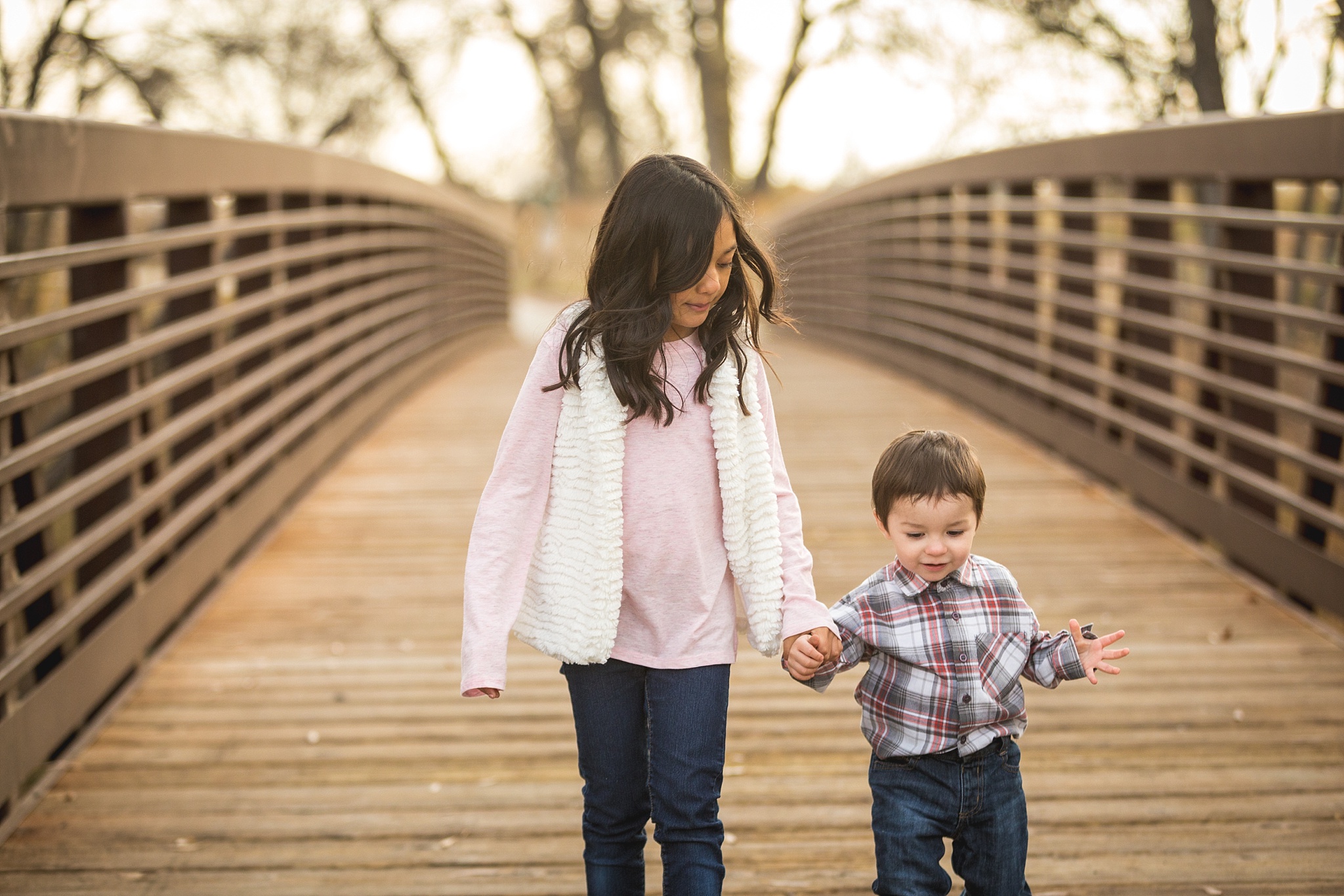 Brother & Sister playing during fall family portraits. The Aguayo Family’s Fall Family Photo Session at Golden Ponds Nature Area by Colorado Family Photographer, Jennifer Garza. Golden Ponds Nature Area Family Photographer, Golden Ponds Nature Area, Golden Ponds, Golden Ponds Family Photographer, Longmont Family Photography, Longmont Family Photographer, Colorado Family Photos, Colorado Family Photographer, Colorado Fall Photos, Fall Photos