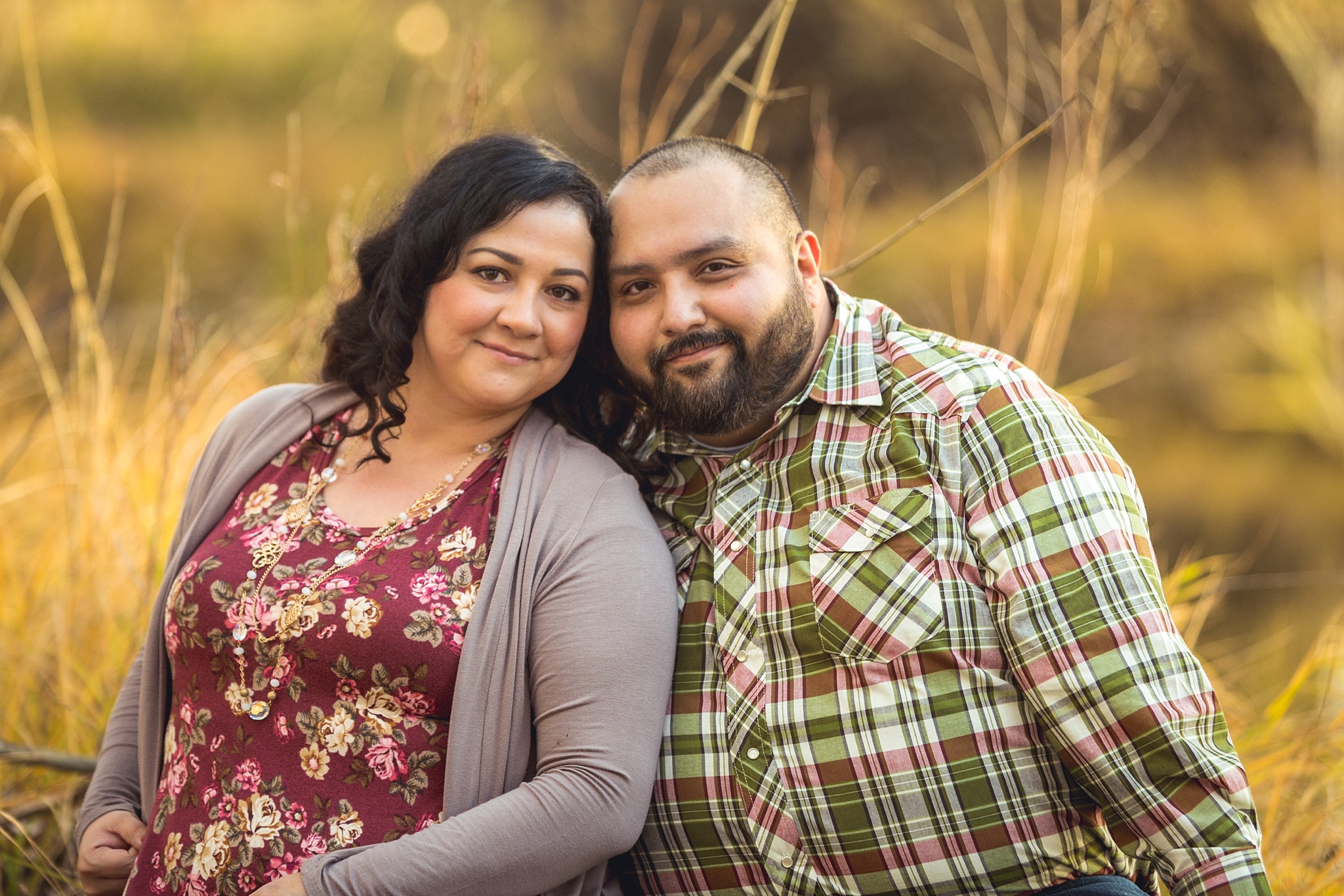 Mom & Dad posing during fall family portraits. The Aguayo Family’s Fall Family Photo Session at Golden Ponds Nature Area by Colorado Family Photographer, Jennifer Garza. Golden Ponds Nature Area Family Photographer, Golden Ponds Nature Area, Golden Ponds, Golden Ponds Family Photographer, Longmont Family Photography, Longmont Family Photographer, Colorado Family Photos, Colorado Family Photographer, Colorado Fall Photos, Fall Photos