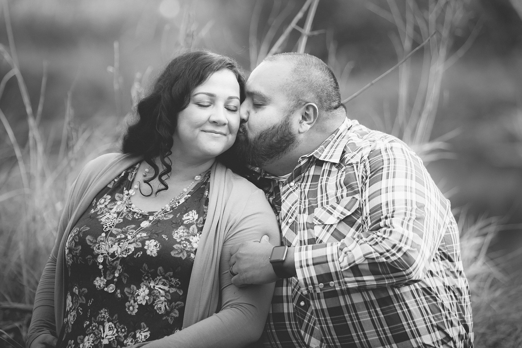 Dad kissing mom on the cheek during fall family portraits. The Aguayo Family’s Fall Family Photo Session at Golden Ponds Nature Area by Colorado Family Photographer, Jennifer Garza. Golden Ponds Nature Area Family Photographer, Golden Ponds Nature Area, Golden Ponds, Golden Ponds Family Photographer, Longmont Family Photography, Longmont Family Photographer, Colorado Family Photos, Colorado Family Photographer, Colorado Fall Photos, Fall Photos