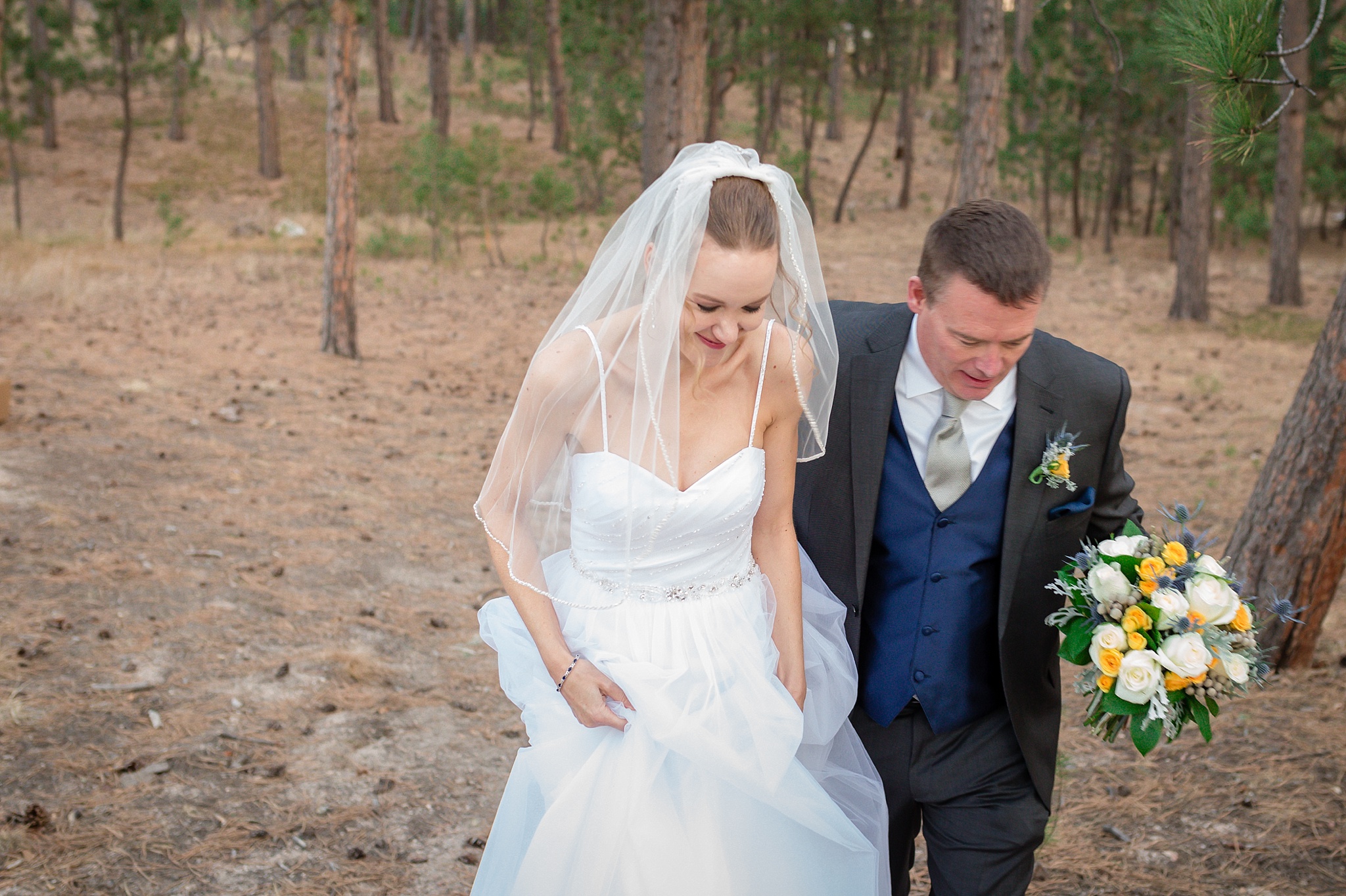 Bride & Groom walking together. Sheri & Damon's Colorado Springs Wedgewood Black Forest Wedding by Colorado Wedding Photographer, Jennifer Garza. Colorado Wedding Photographer, Colorado Wedding Photography, Colorado Springs Wedding Photographer, Colorado Springs Wedding Photography, Wedgewood Weddings, Wedgewood Weddings Black Forest, Wedgewood Black Forest, Colorado Wedding, Mountain Wedding, Rocky Mountain Bride, Colorado Bride