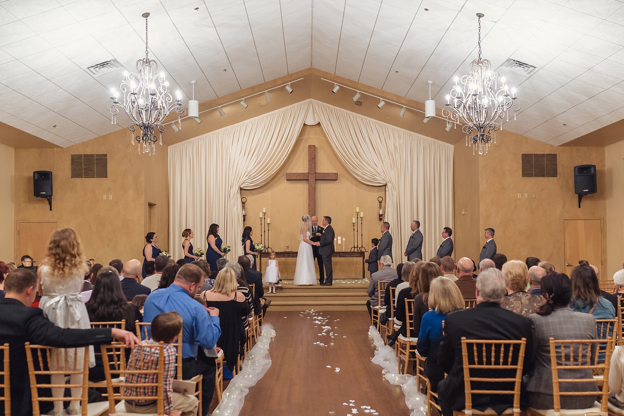 Bride & Groom exchanging vows at the altar. Sheri & Damon's Colorado Springs Wedgewood Black Forest Wedding by Colorado Wedding Photographer, Jennifer Garza. Colorado Wedding Photographer, Colorado Wedding Photography, Colorado Springs Wedding Photographer, Colorado Springs Wedding Photography, Wedgewood Weddings, Wedgewood Weddings Black Forest, Wedgewood Black Forest, Colorado Wedding, Mountain Wedding, Rocky Mountain Bride, Colorado Bride