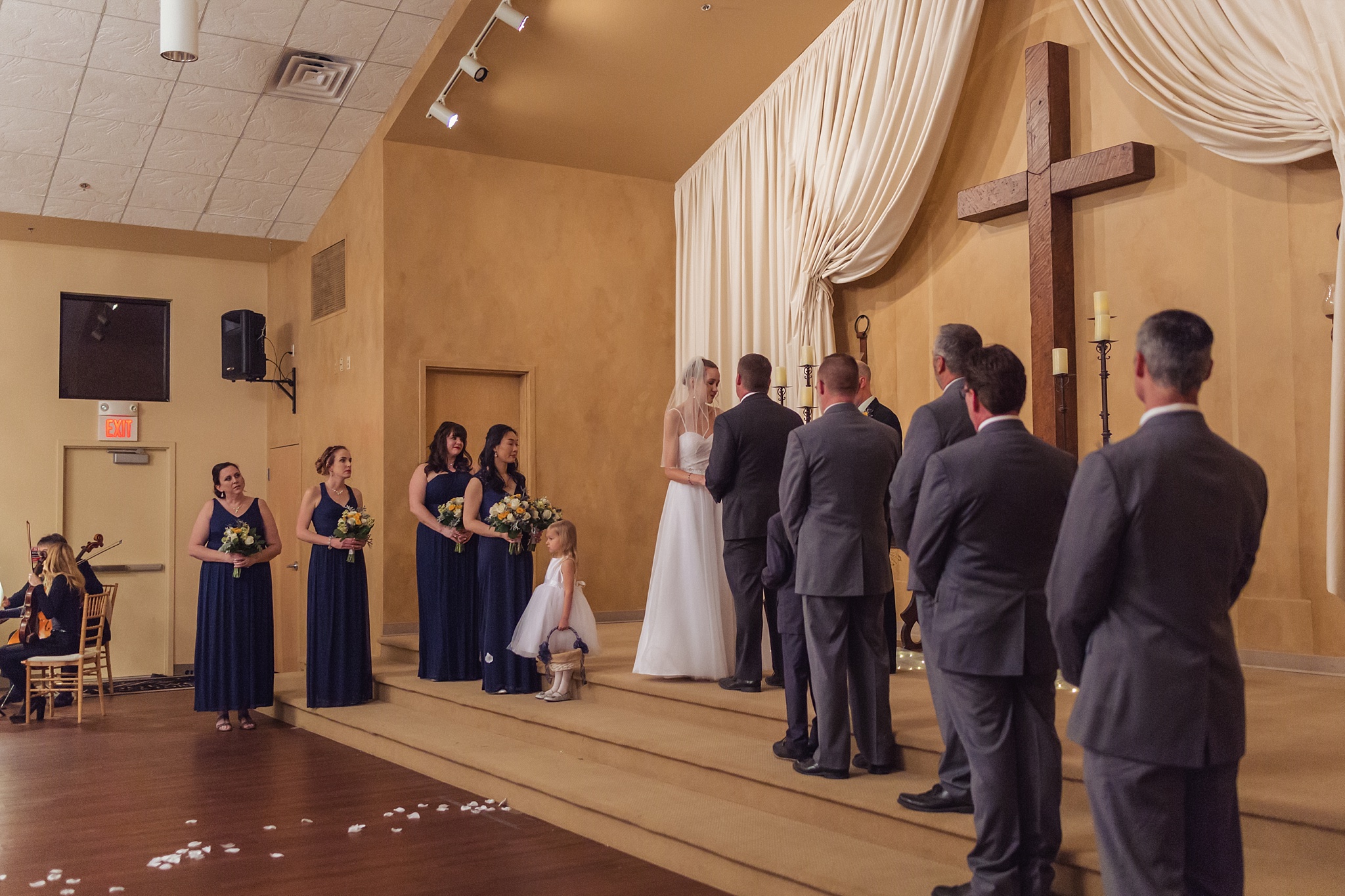 Bride & Groom exchanging vows at the altar. Sheri & Damon's Colorado Springs Wedgewood Black Forest Wedding by Colorado Wedding Photographer, Jennifer Garza. Colorado Wedding Photographer, Colorado Wedding Photography, Colorado Springs Wedding Photographer, Colorado Springs Wedding Photography, Wedgewood Weddings, Wedgewood Weddings Black Forest, Wedgewood Black Forest, Colorado Wedding, Mountain Wedding, Rocky Mountain Bride, Colorado Bride