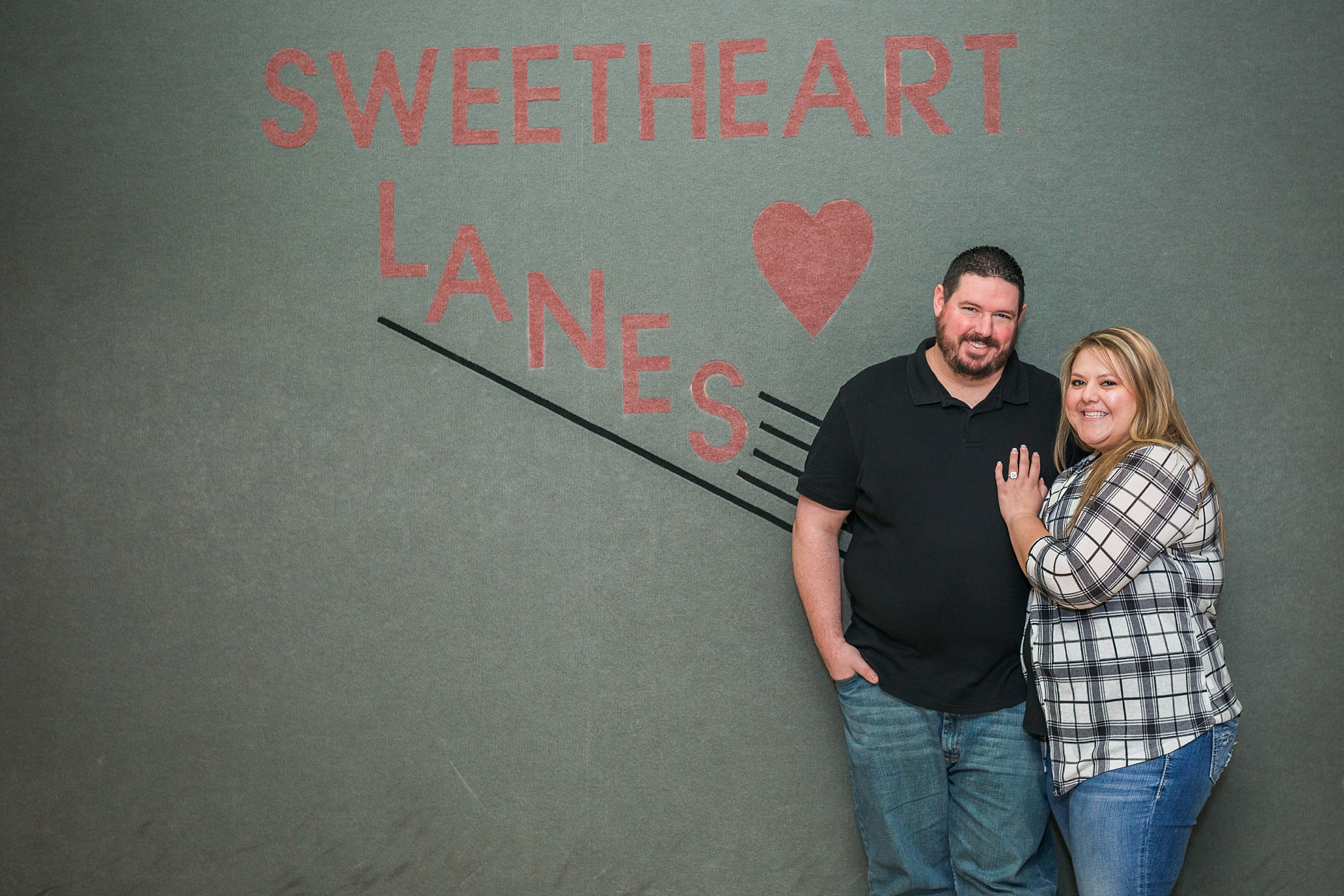 Couple standing in front of sign during their bowling alley engagement session. Briana & Kevin’s Devil’s Backbone and Sweetheart Lanes Engagement Session by Colorado Engagement Photographer, Jennifer Garza. Devil's Backbone Engagement, Devil's Backbone Engagement Session, Loveland Engagement Session, Colorado Engagement Photography, Colorado Engagement Photos, Sweetheart Lanes Bowling Alley, Bowling Alley Engagement, Bowling Engagement Session, Bowling Engagement Photography, Wedding Inspo, Colorado Wedding, Colorado Bride, Brides of Colorado, Bride to Be, Couples Goals