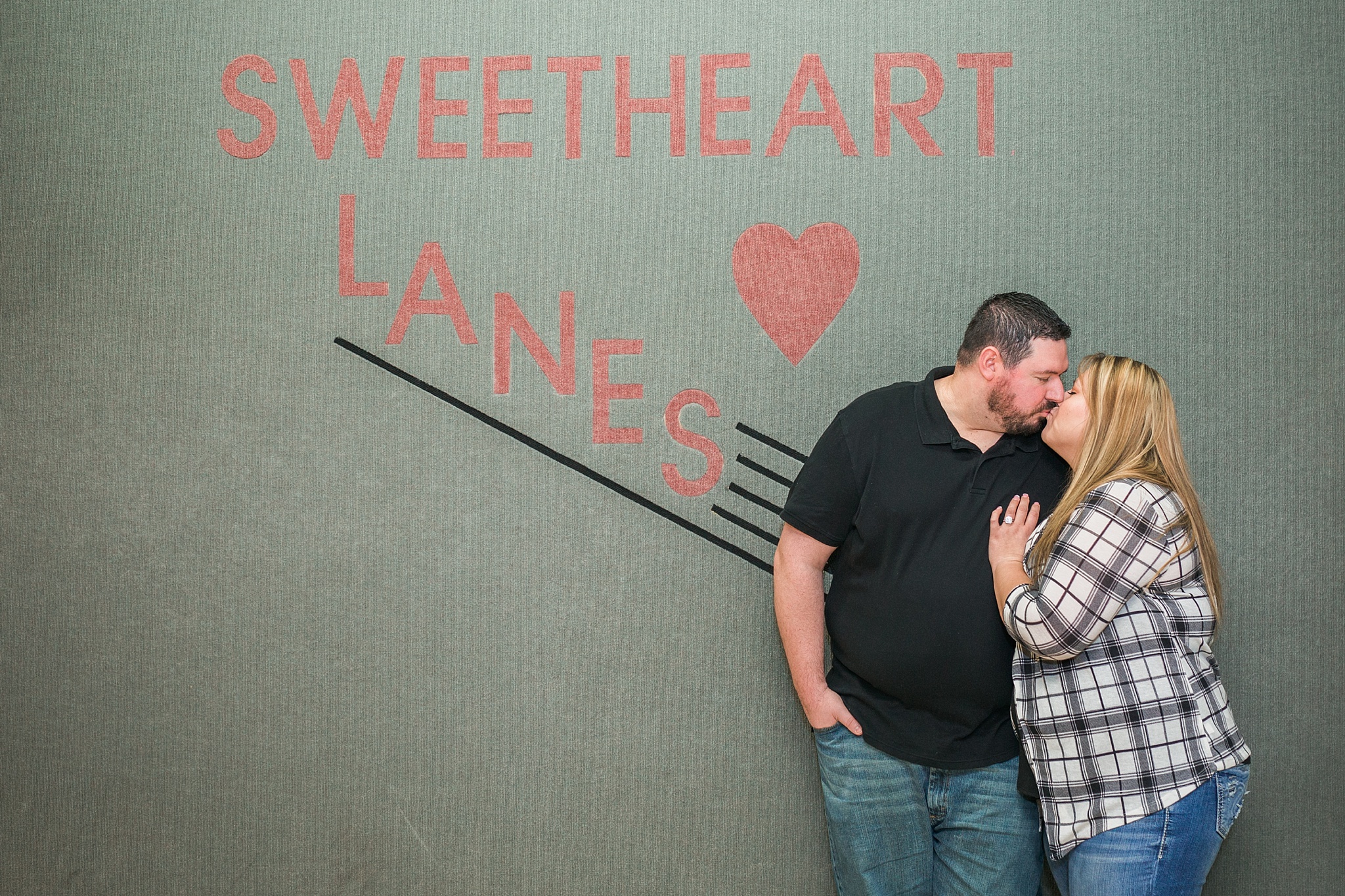 Couple kissing in front of sign during their bowling alley engagement session. Briana & Kevin’s Devil’s Backbone and Sweetheart Lanes Engagement Session by Colorado Engagement Photographer, Jennifer Garza. Devil's Backbone Engagement, Devil's Backbone Engagement Session, Loveland Engagement Session, Colorado Engagement Photography, Colorado Engagement Photos, Sweetheart Lanes Bowling Alley, Bowling Alley Engagement, Bowling Engagement Session, Bowling Engagement Photography, Wedding Inspo, Colorado Wedding, Colorado Bride, Brides of Colorado, Bride to Be, Couples Goals