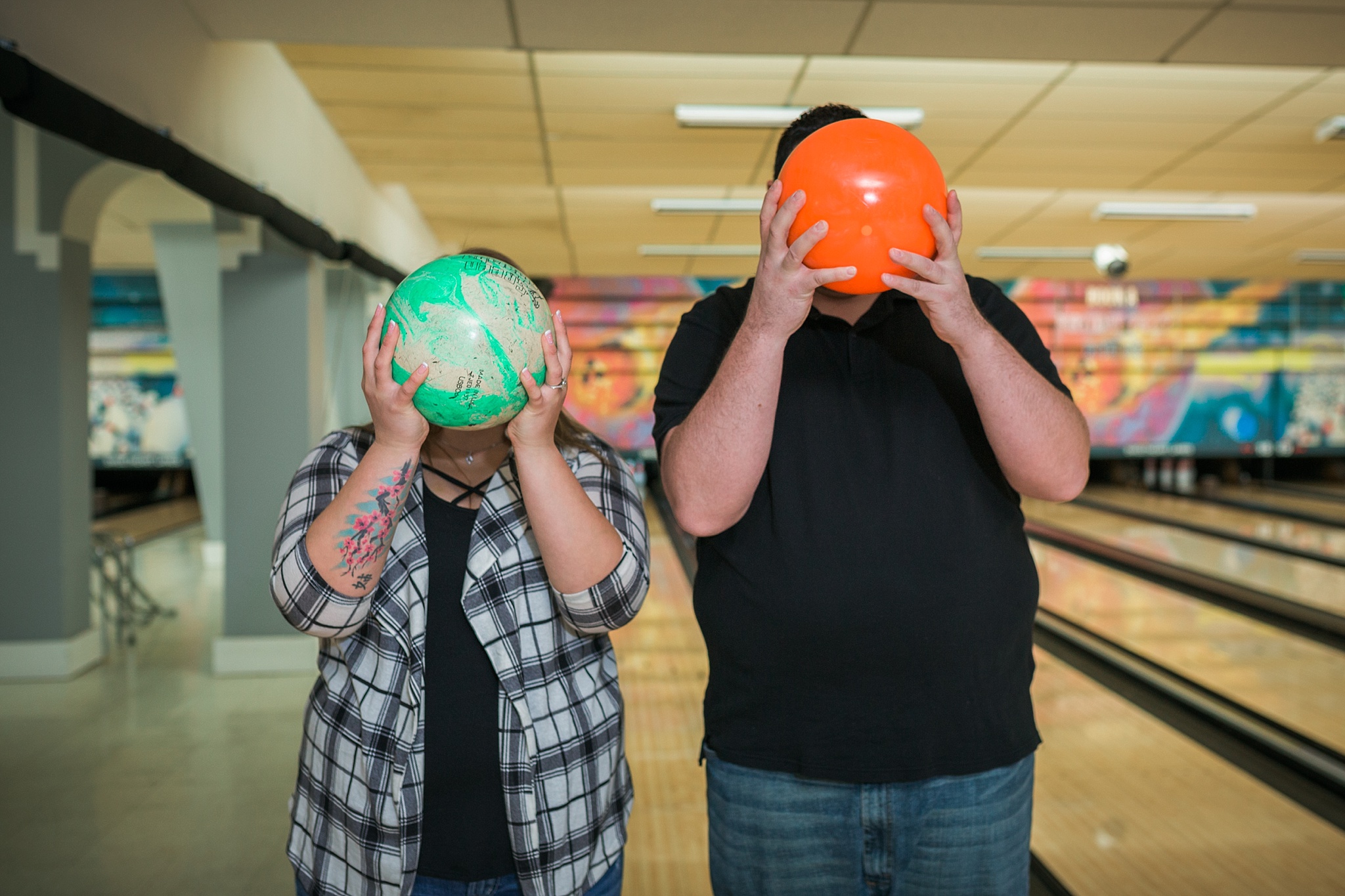 Couple holding bowling balls and kissing during their bowling alley engagement session. Briana & Kevin’s Devil’s Backbone and Sweetheart Lanes Engagement Session by Colorado Engagement Photographer, Jennifer Garza. Devil's Backbone Engagement, Devil's Backbone Engagement Session, Loveland Engagement Session, Colorado Engagement Photography, Colorado Engagement Photos, Sweetheart Lanes Bowling Alley, Bowling Alley Engagement, Bowling Engagement Session, Bowling Engagement Photography, Wedding Inspo, Colorado Wedding, Colorado Bride, Brides of Colorado, Bride to Be, Couples Goals