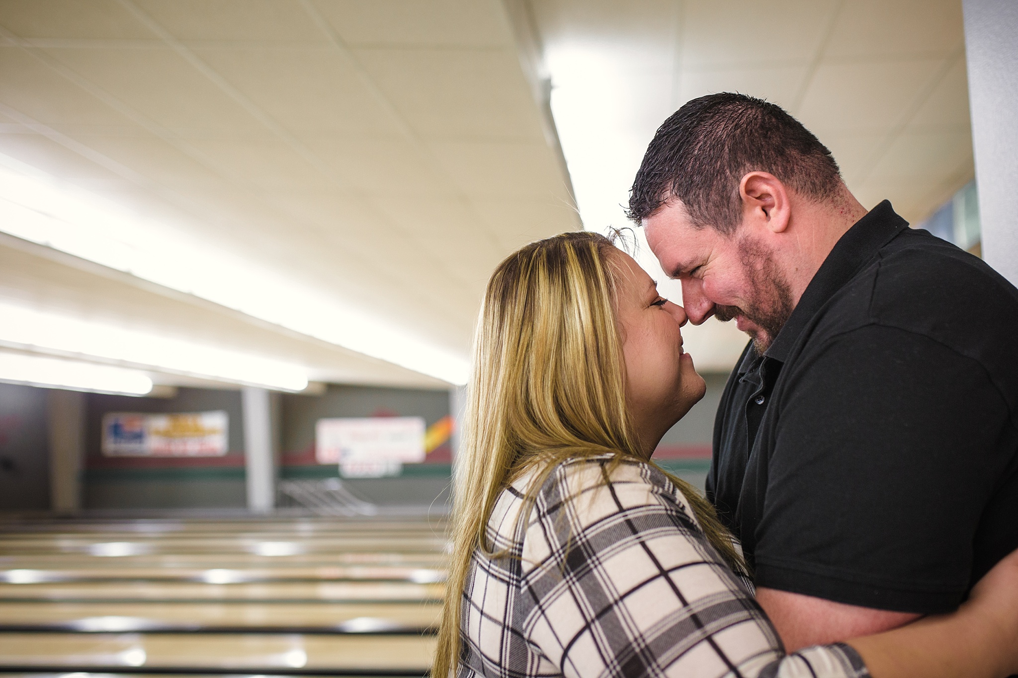Couple embracing during their bowling alley engagement session. Briana & Kevin’s Devil’s Backbone and Sweetheart Lanes Engagement Session by Colorado Engagement Photographer, Jennifer Garza. Devil's Backbone Engagement, Devil's Backbone Engagement Session, Loveland Engagement Session, Colorado Engagement Photography, Colorado Engagement Photos, Sweetheart Lanes Bowling Alley, Bowling Alley Engagement, Bowling Engagement Session, Bowling Engagement Photography, Wedding Inspo, Colorado Wedding, Colorado Bride, Brides of Colorado, Bride to Be, Couples Goals