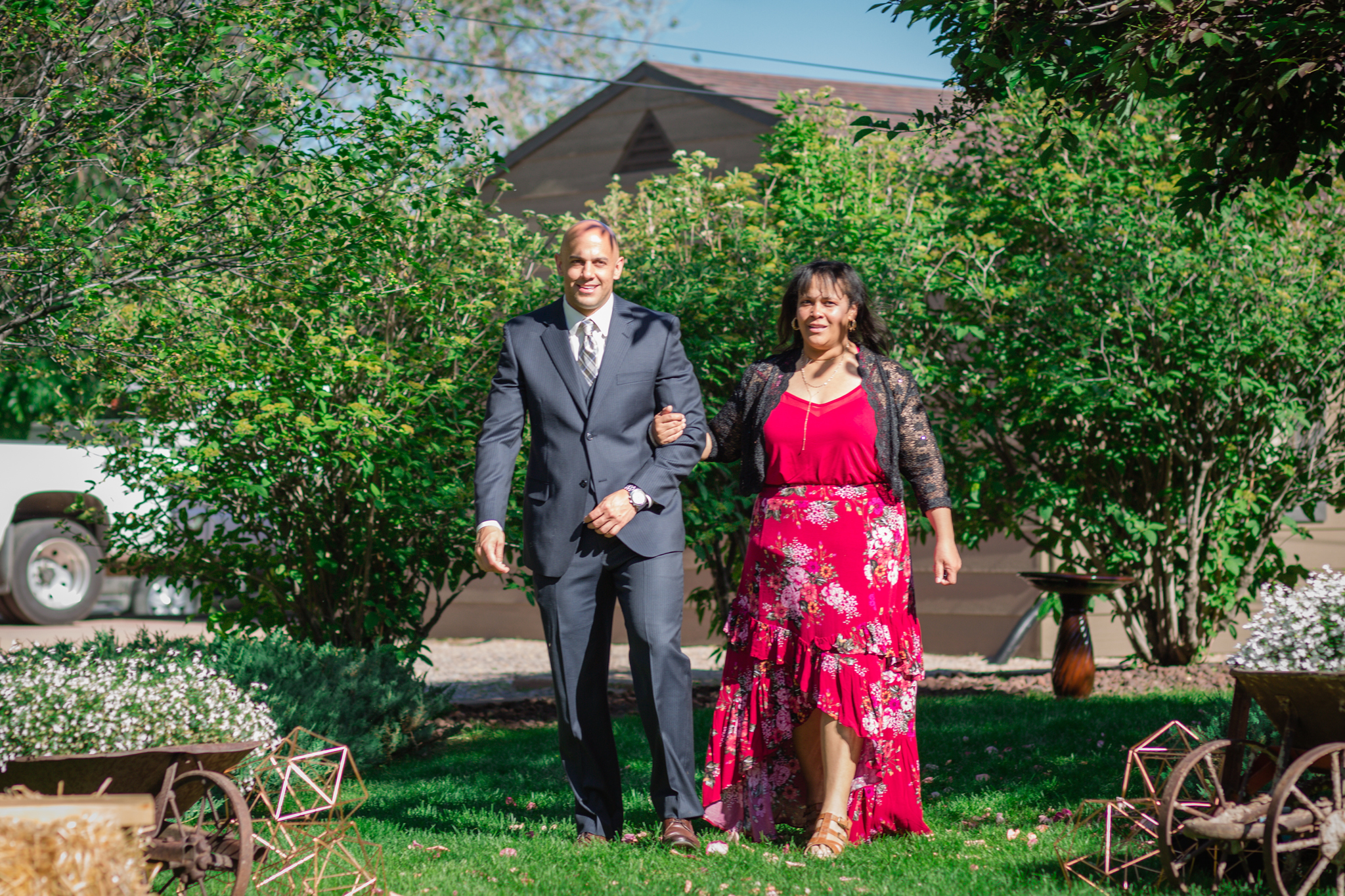 Groom and his mother walking down the aisle at the beginning ceremony. Kyley & Brian's Boulder Backyard Wedding and The Mediterranean Restaurant Reception by Colorado Wedding Photographer, Jennifer Garza. Colorado Wedding Photographer, Colorado Wedding Photography, Colorado Top Wedding Photographer, Boulder Wedding Photographer, Boulder Wedding, Backyard Wedding Photographer, Backyard Wedding, The Mediterranean Restaurant, The Med, The Med Reception, Intimate Wedding, Small Intimate Wedding, Rocky Mountain Wedding, Rocky Mountain Bride, Colorado Bride, Here Comes the Bride, Couples Goals, Brides of Colorado