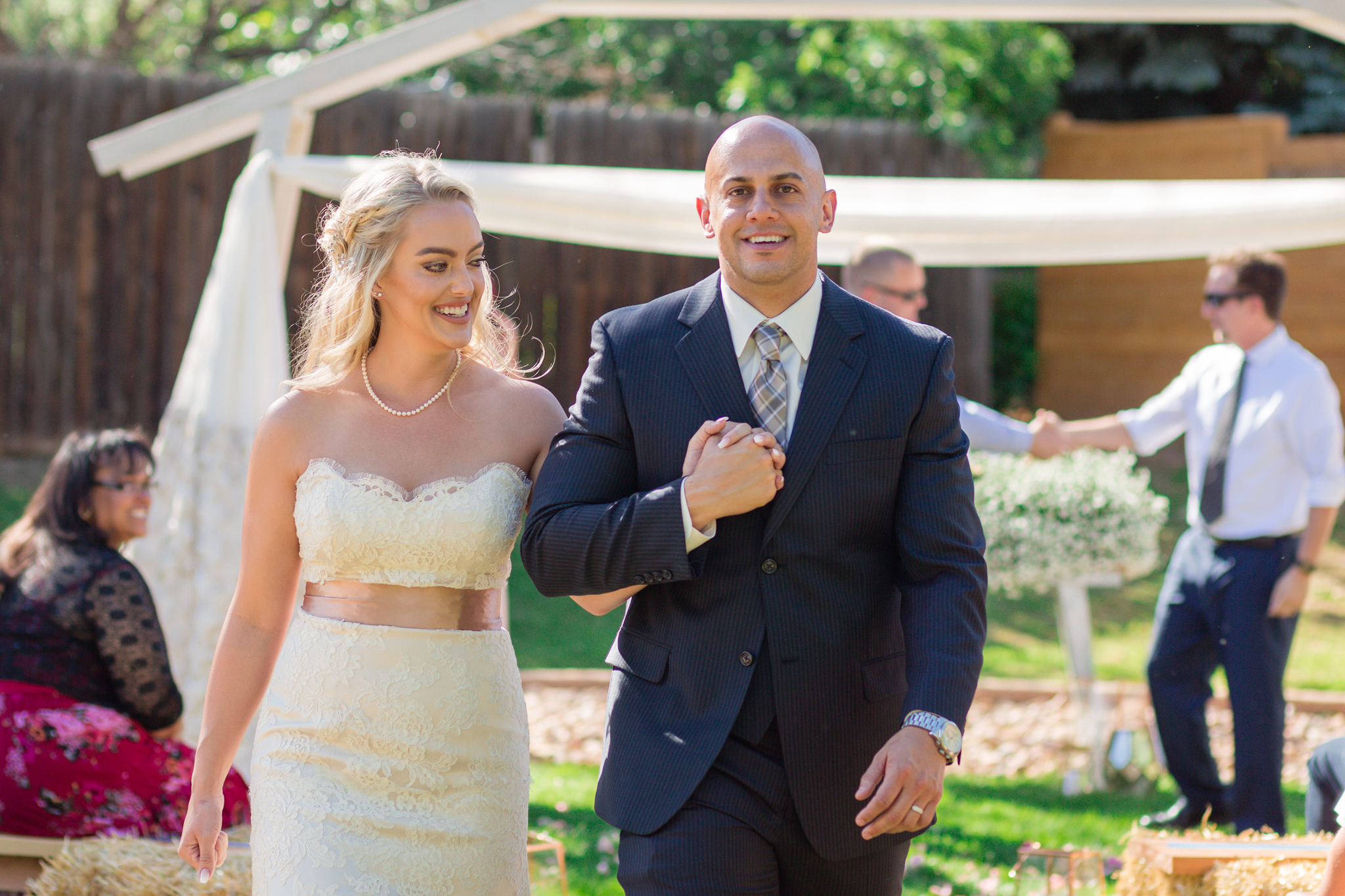 Bride and Groom’s walking up the aisle at the end of their wedding ceremony. Kyley & Brian's Boulder Backyard Wedding and The Mediterranean Restaurant Reception by Colorado Wedding Photographer, Jennifer Garza. Colorado Wedding Photographer, Colorado Wedding Photography, Colorado Top Wedding Photographer, Boulder Wedding Photographer, Boulder Wedding, Backyard Wedding Photographer, Backyard Wedding, The Mediterranean Restaurant, The Med, The Med Reception, Intimate Wedding, Small Intimate Wedding, Rocky Mountain Wedding, Rocky Mountain Bride, Colorado Bride, Here Comes the Bride, Couples Goals, Brides of Colorado