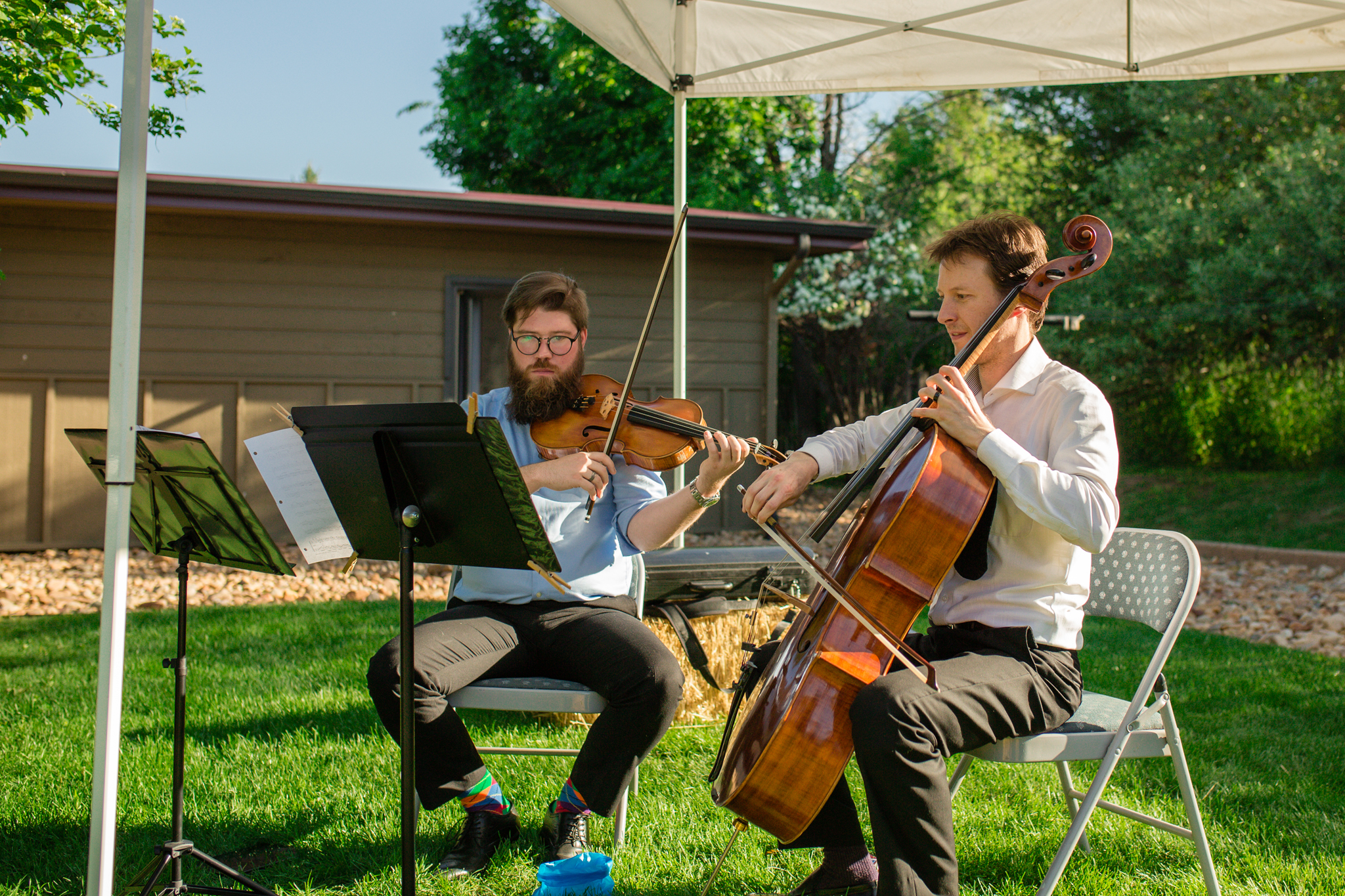 Cello & Violinist playing at the end of the wedding ceremony. Kyley & Brian's Boulder Backyard Wedding and The Mediterranean Restaurant Reception by Colorado Wedding Photographer, Jennifer Garza. Colorado Wedding Photographer, Colorado Wedding Photography, Colorado Top Wedding Photographer, Boulder Wedding Photographer, Boulder Wedding, Backyard Wedding Photographer, Backyard Wedding, The Mediterranean Restaurant, The Med, The Med Reception, Intimate Wedding, Small Intimate Wedding, Rocky Mountain Wedding, Rocky Mountain Bride, Colorado Bride, Here Comes the Bride, Couples Goals, Brides of Colorado
