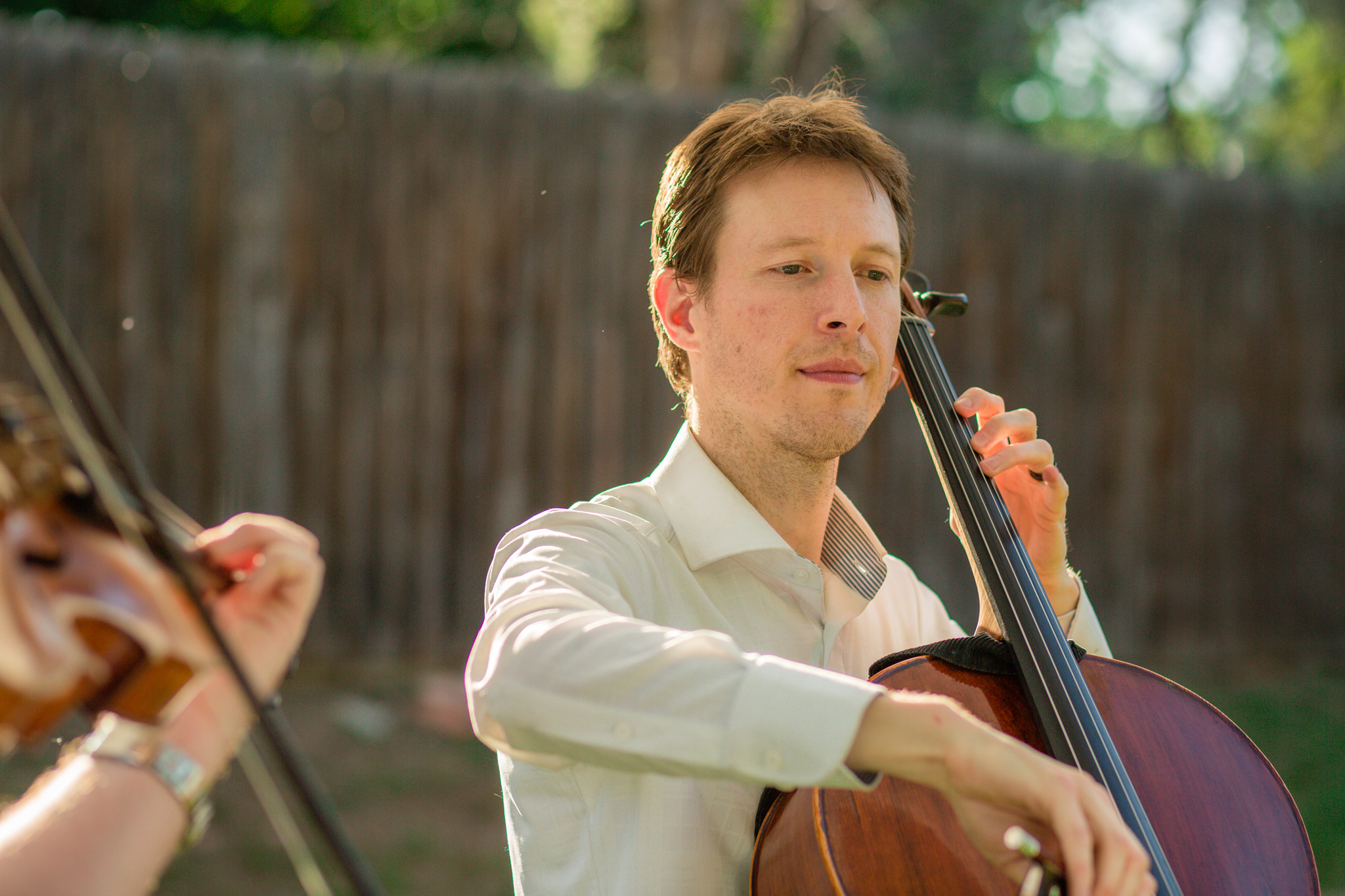 Cello & Violinist playing at the end of the wedding ceremony. Kyley & Brian's Boulder Backyard Wedding and The Mediterranean Restaurant Reception by Colorado Wedding Photographer, Jennifer Garza. Colorado Wedding Photographer, Colorado Wedding Photography, Colorado Top Wedding Photographer, Boulder Wedding Photographer, Boulder Wedding, Backyard Wedding Photographer, Backyard Wedding, The Mediterranean Restaurant, The Med, The Med Reception, Intimate Wedding, Small Intimate Wedding, Rocky Mountain Wedding, Rocky Mountain Bride, Colorado Bride, Here Comes the Bride, Couples Goals, Brides of Colorado