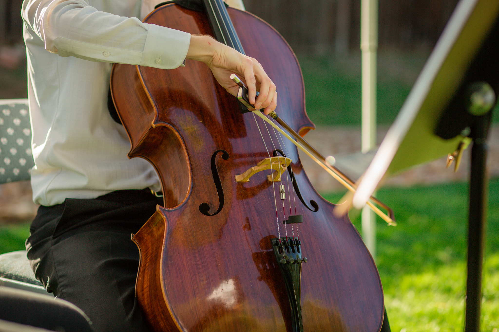 Cello & Violinist playing at the end of the wedding ceremony. Kyley & Brian's Boulder Backyard Wedding and The Mediterranean Restaurant Reception by Colorado Wedding Photographer, Jennifer Garza. Colorado Wedding Photographer, Colorado Wedding Photography, Colorado Top Wedding Photographer, Boulder Wedding Photographer, Boulder Wedding, Backyard Wedding Photographer, Backyard Wedding, The Mediterranean Restaurant, The Med, The Med Reception, Intimate Wedding, Small Intimate Wedding, Rocky Mountain Wedding, Rocky Mountain Bride, Colorado Bride, Here Comes the Bride, Couples Goals, Brides of Colorado