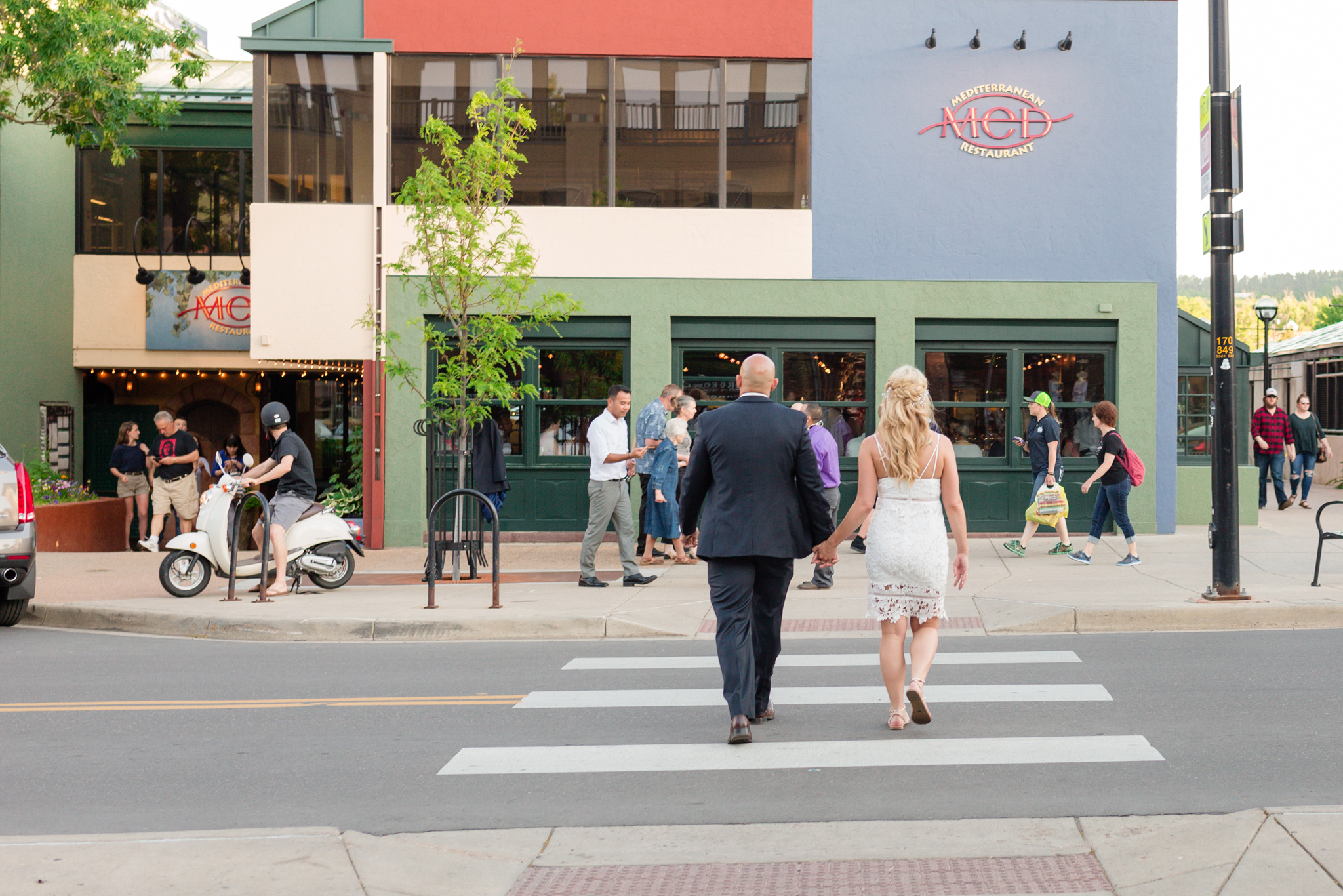 Bride & Groom walking towards The Med Restaurant in Boulder. Kyley & Brian's Boulder Backyard Wedding and The Mediterranean Restaurant Reception by Colorado Wedding Photographer, Jennifer Garza. Colorado Wedding Photographer, Colorado Wedding Photography, Colorado Top Wedding Photographer, Boulder Wedding Photographer, Boulder Wedding, Backyard Wedding Photographer, Backyard Wedding, The Mediterranean Restaurant, The Med, The Med Reception, Intimate Wedding, Small Intimate Wedding, Rocky Mountain Wedding, Rocky Mountain Bride, Colorado Bride, Here Comes the Bride, Couples Goals, Brides of Colorado