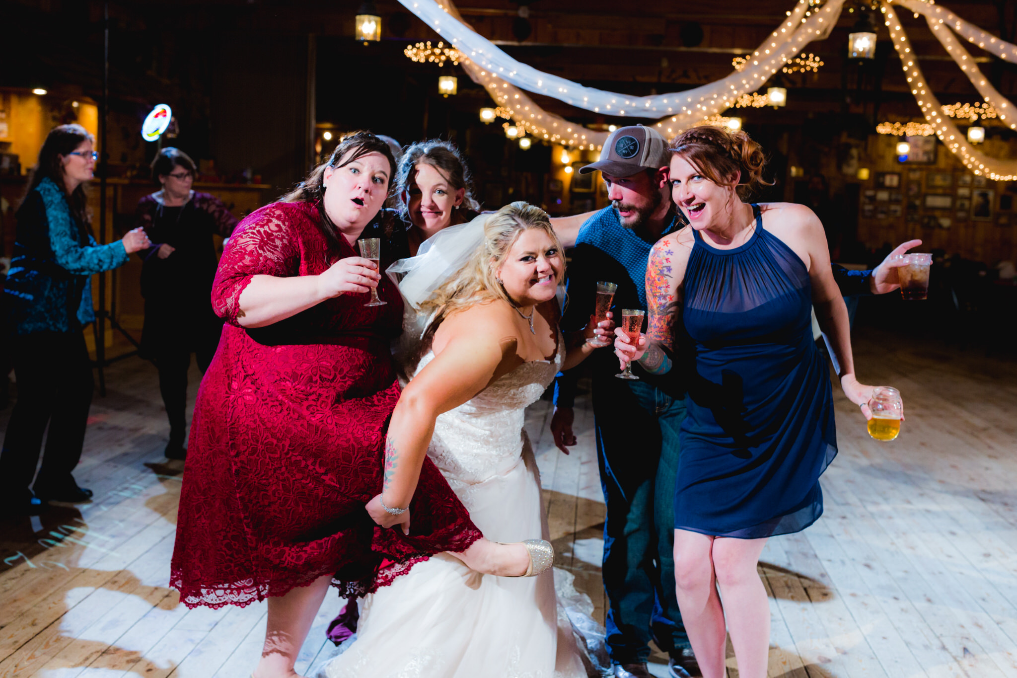 The bride posing for pictures with friends during the wedding reception. Briana and Kevin's Terry Bison Ranch Wedding by Wyoming Wedding Photographer Jennifer Garza, Wyoming Wedding, Wyoming Wedding Photographer, Wyoming Engagement Photographer, Wyoming Bride, Couples Goals, Wyoming Wedding, Wedding Photographer, Wyoming Photographer, Wyoming Wedding Photography, Wedding Inspiration, Destination Wedding Photographer, Fall Wedding, Ranch Wedding, Rustic Wedding Inspiration, Wedding Dress Inspo