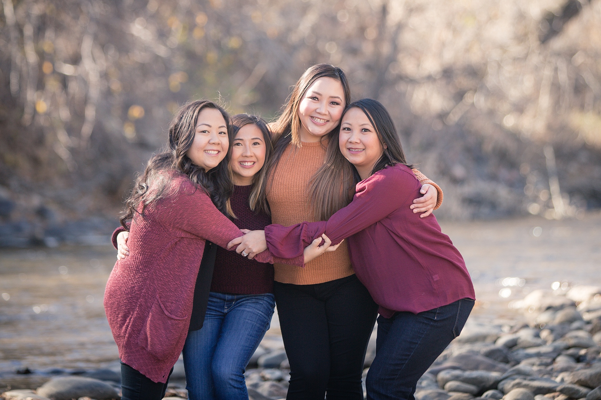 Sisters hugging during an extended family session. The Lee & Lor’s Family Photo Session at Clear Creek History Park by Colorado Family Photographer, Jennifer Garza. Colorado Family Photography, Colorado Family Photographer, Clear Creek History Park Family Photographer, Clear Creek History Park Family Photography, Clear Creek History Park, Golden History Park Family Photographer, Golden Family Photographer, Golden Family Photography, Golden History Park, Denver Family Photos