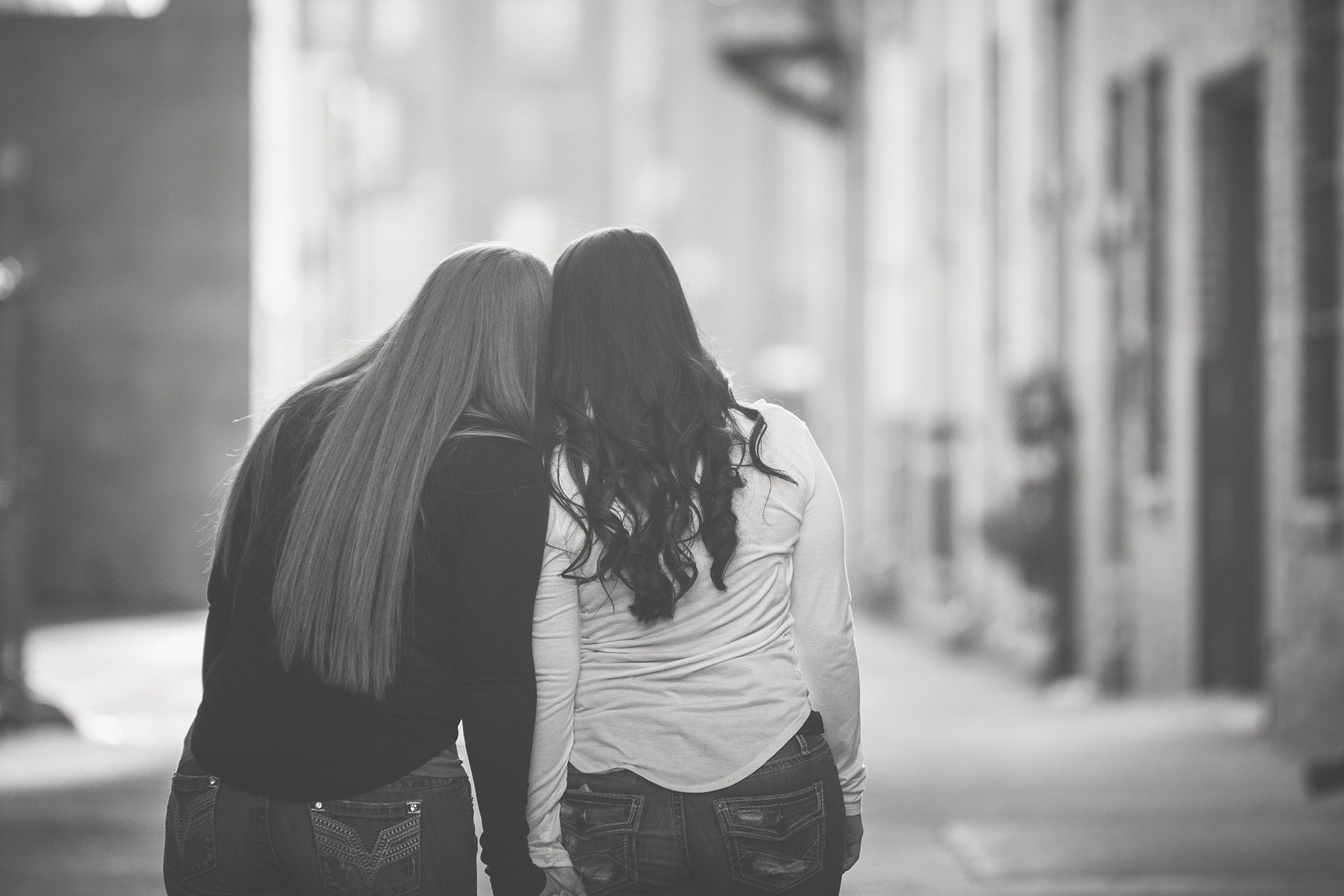 Same-sex couple walking together down an alley. Jessica & Caity’s Same-Sex Engagement Session at 10 Barrel Brewery & RiNo District by Colorado Engagement Photographer, Jennifer Garza. 10 Barrel Brewery Engagement, Brewery Engagement Photos, RiNo District Engagement Photos, RiNo District, RiNo Engagement Photography, Denver Engagement Photography, Denver Engagement, Colorado Engagement Photography, Urban Engagement Photos, Same-Sex Engagement Photography, Same-Sex Engagement Photos, Same-Sex Marriage, Love is Love, LGBTQ