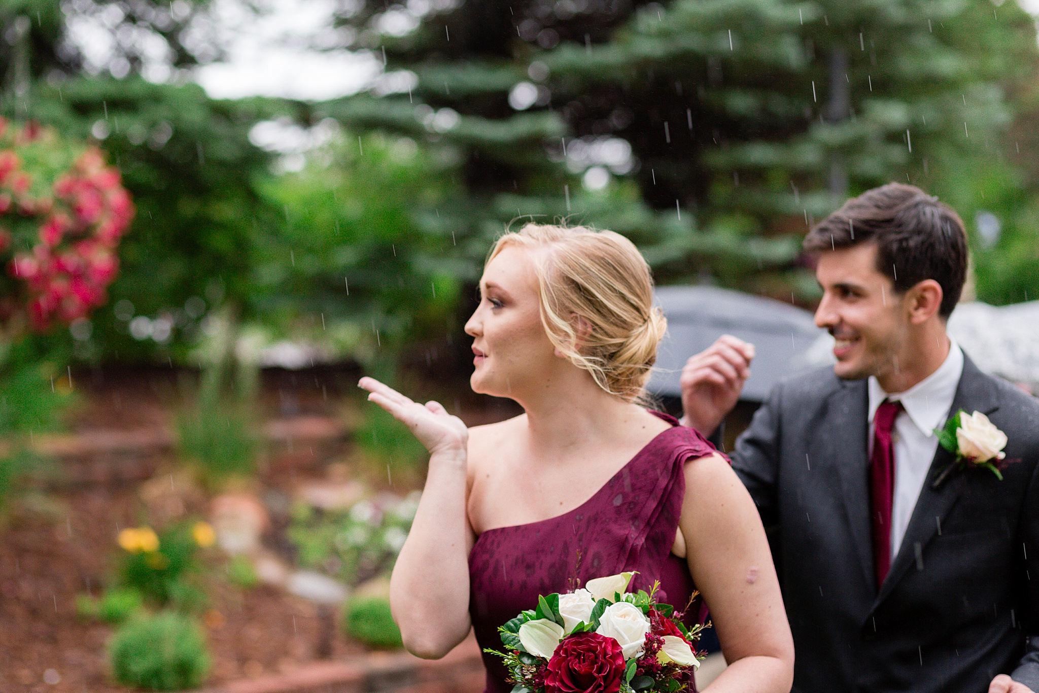 Bridal party walking down the aisle at a rainy summer wedding. Tania & Chris' Denver Wedding at the Wedgewood Ken Caryl by Colorado Wedding Photography, Jennifer Garza. Colorado Wedding Photographer, Colorado Wedding Photography, Denver Wedding Photographer, Denver Wedding Photography, US Marine Corp Wedding, US Marine Corp, Military Wedding, US Marines, Wedgewood Weddings, Wedgewood Weddings Ken Caryl, Colorado Wedding, Denver Wedding, Wedding Photographer, Colorado Bride, Brides of Colorado