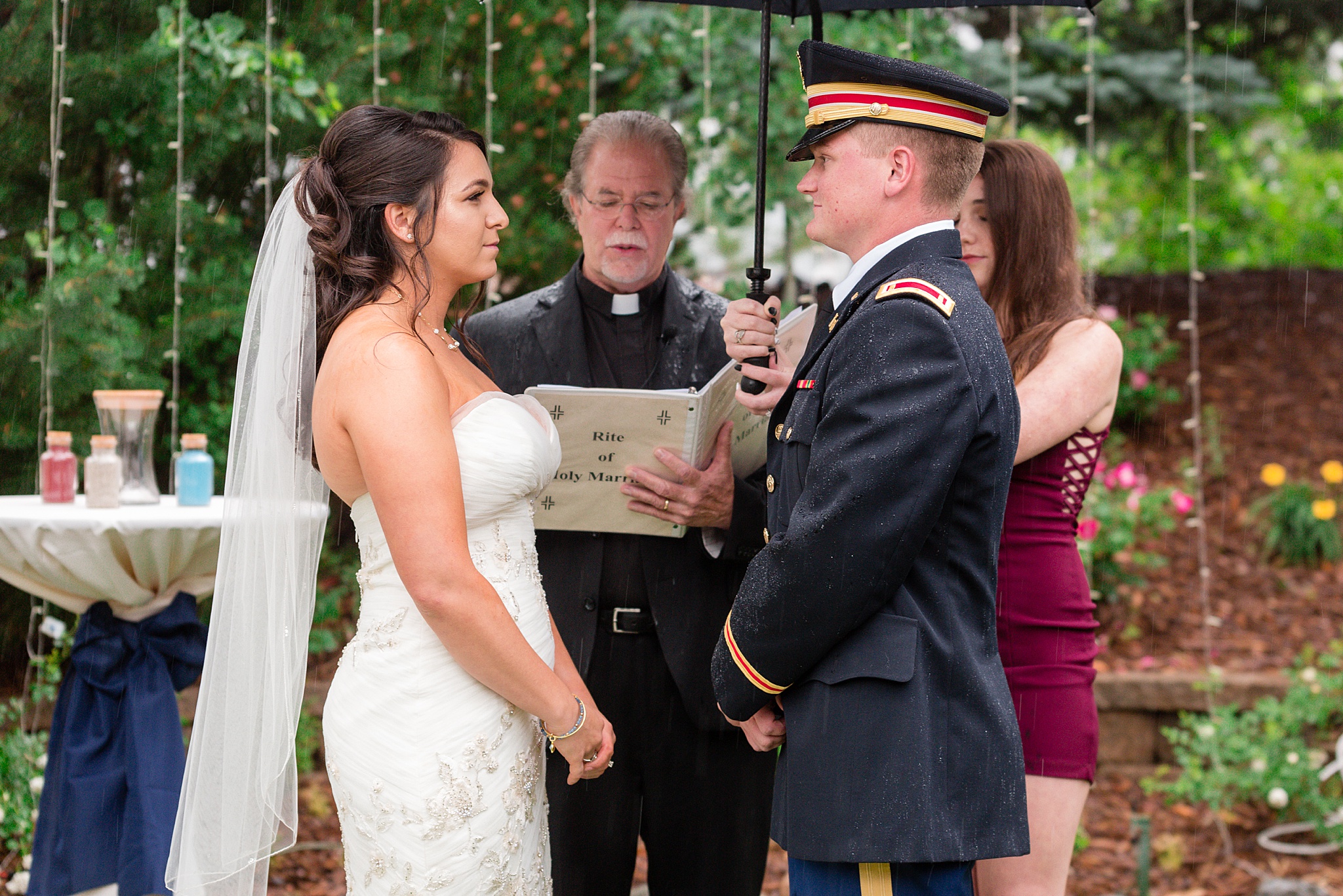 Bride & Groom exchanging vows during a rainy summer wedding. Tania & Chris' Denver Wedding at the Wedgewood Ken Caryl by Colorado Wedding Photography, Jennifer Garza. Colorado Wedding Photographer, Colorado Wedding Photography, Denver Wedding Photographer, Denver Wedding Photography, US Marine Corp Wedding, US Marine Corp, Military Wedding, US Marines, Wedgewood Weddings, Wedgewood Weddings Ken Caryl, Colorado Wedding, Denver Wedding, Wedding Photographer, Colorado Bride, Brides of Colorado